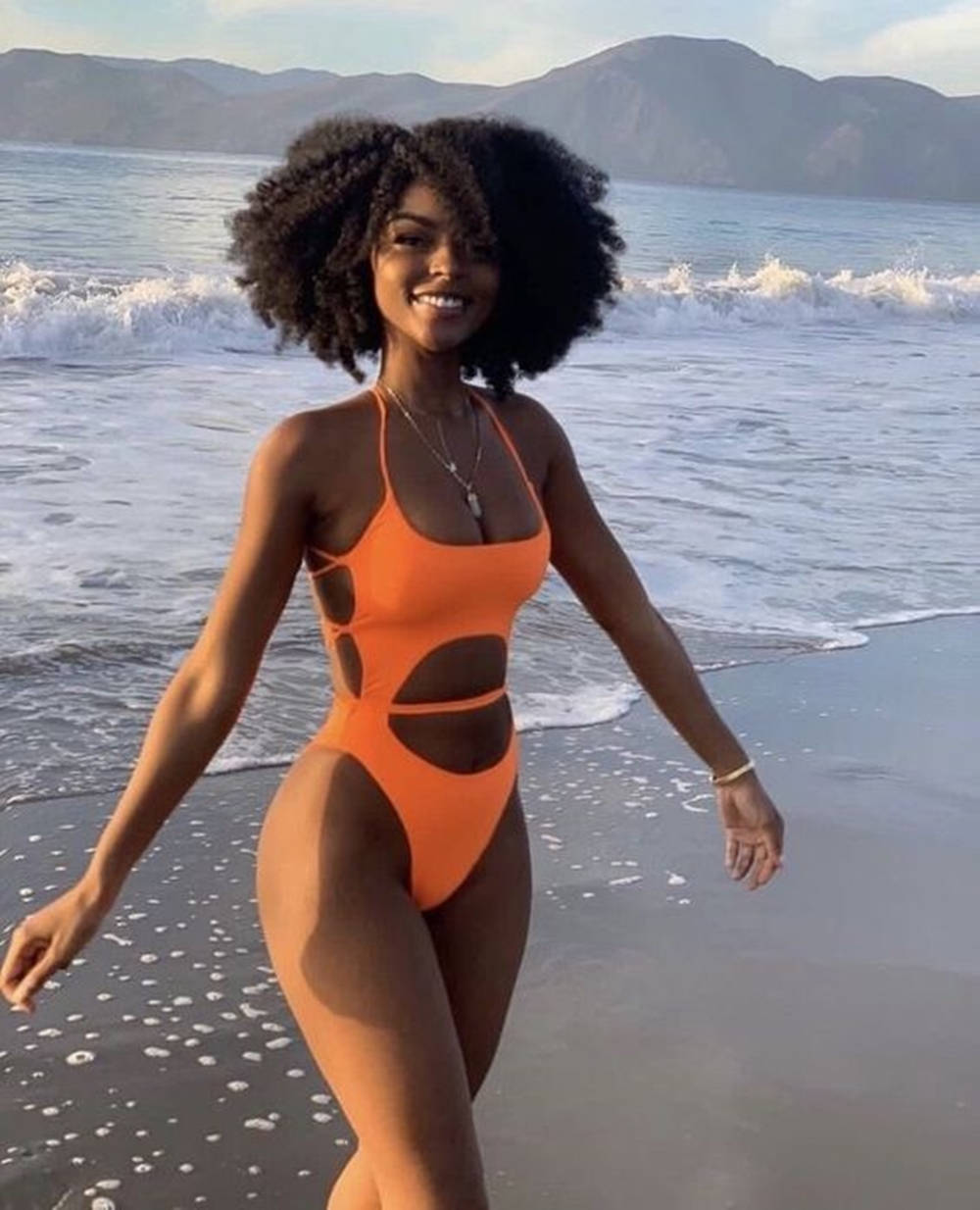 Black Woman In Bikini Waves Background