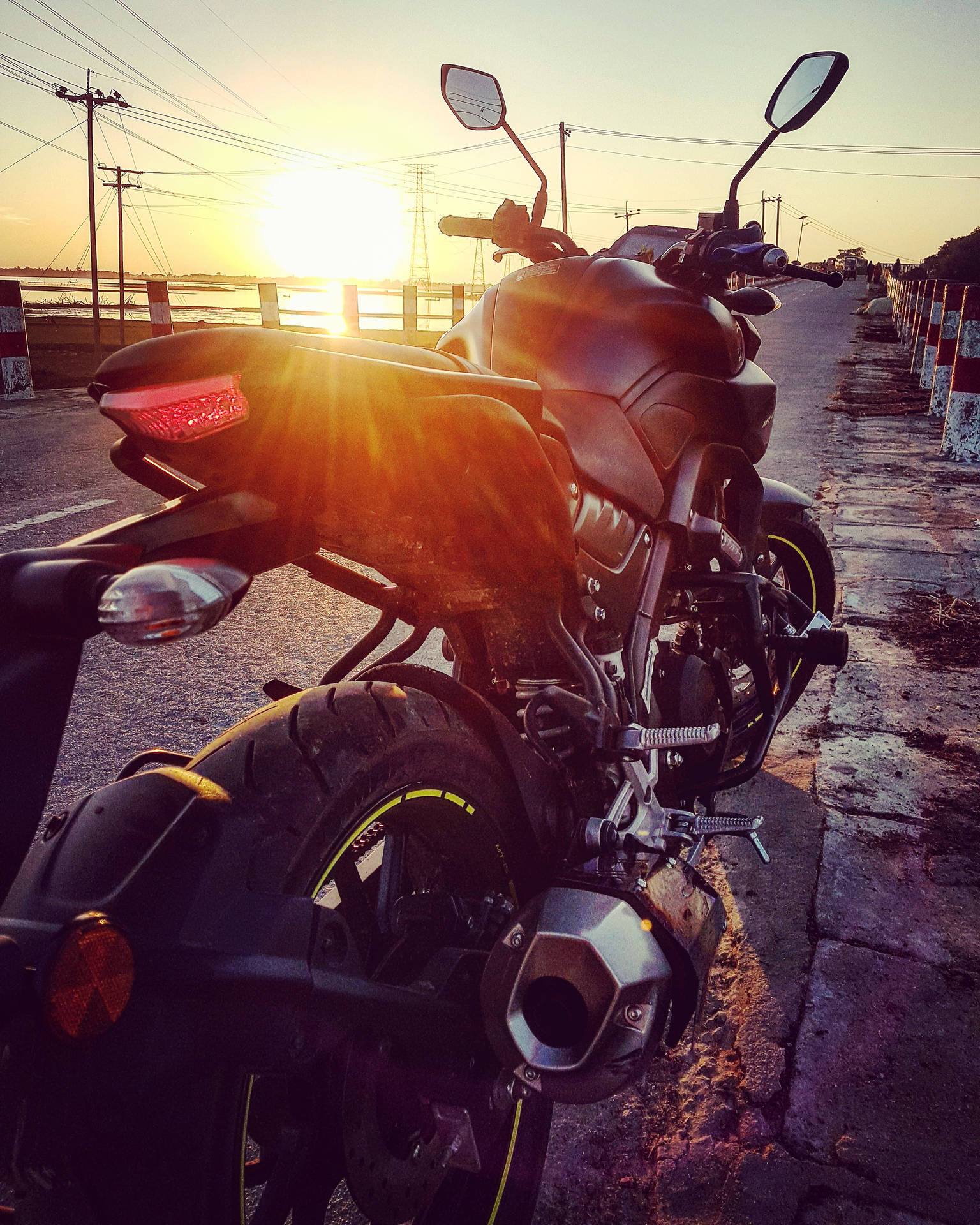 Black Yamaha Mt 15 Over Sunset Background