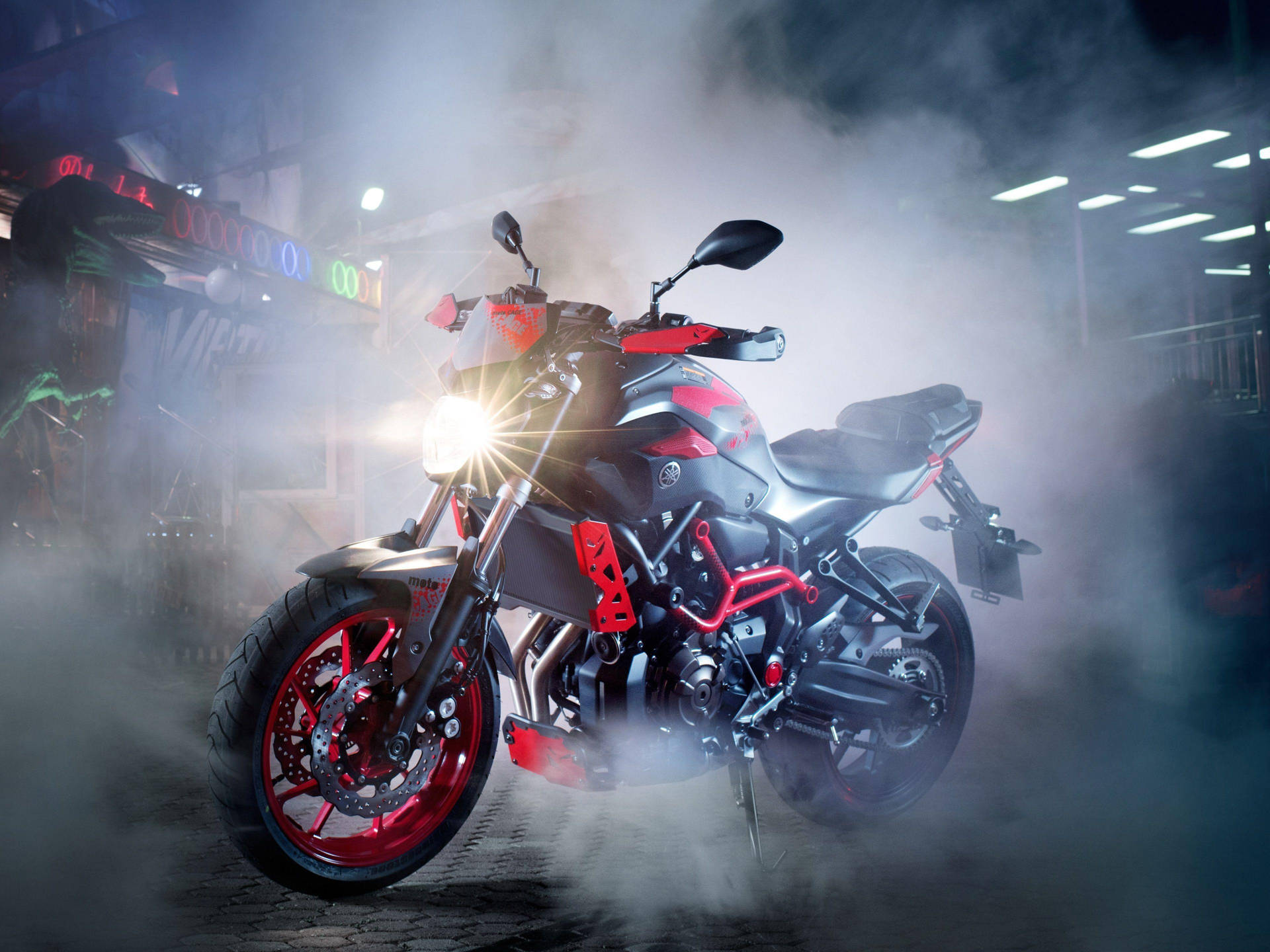 Black Yamaha Mt 15 With Red Accessories Background