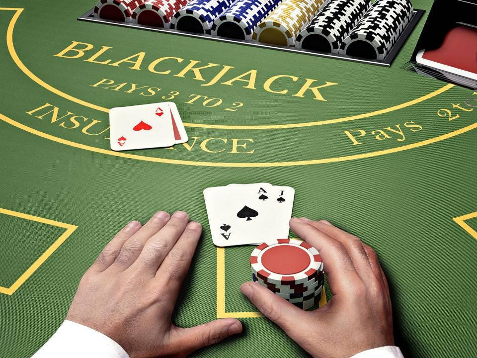 Blackjack Dealer Holding Poker Chips