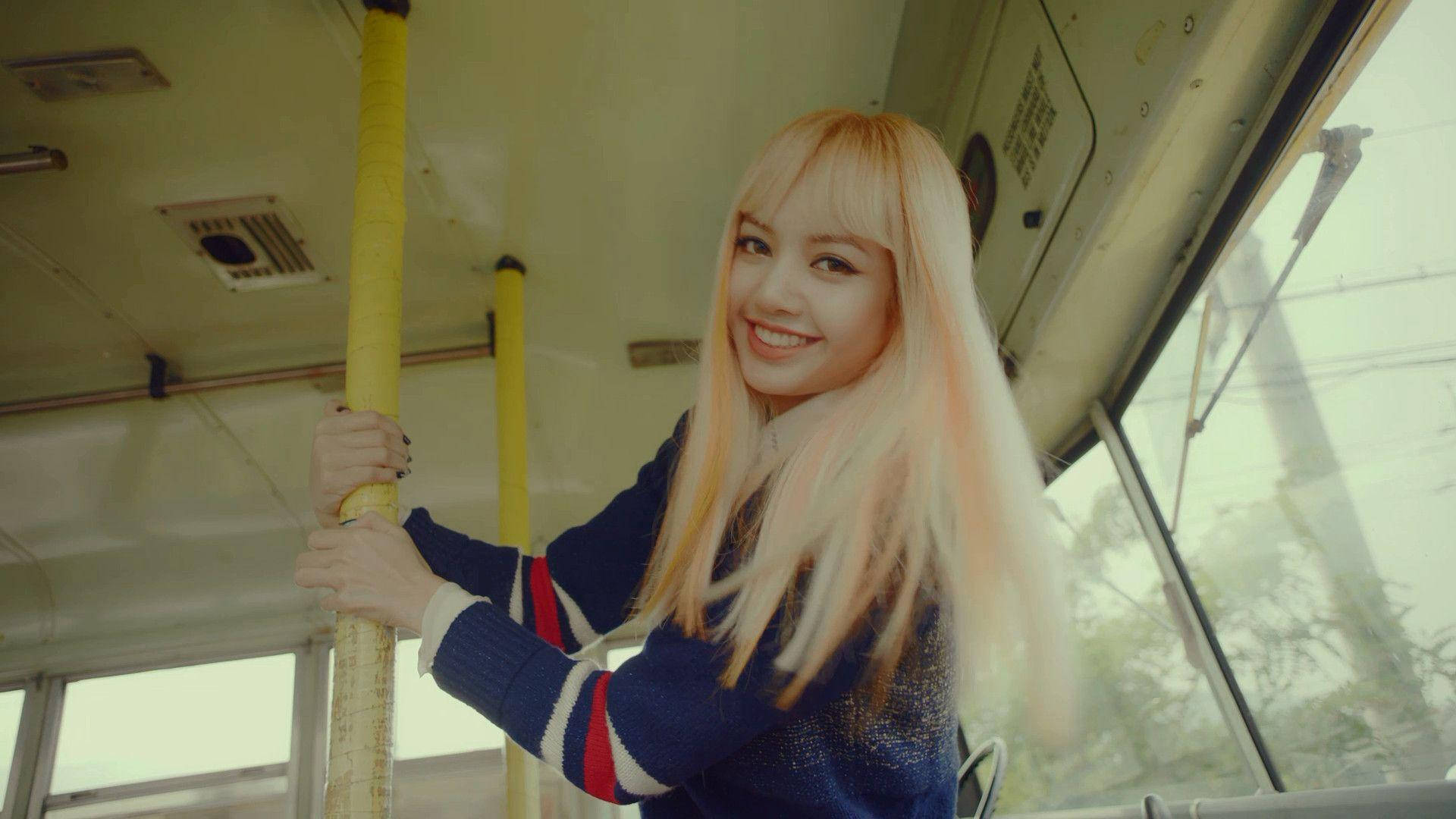 Blackpink Lisa Riding A Bus Background