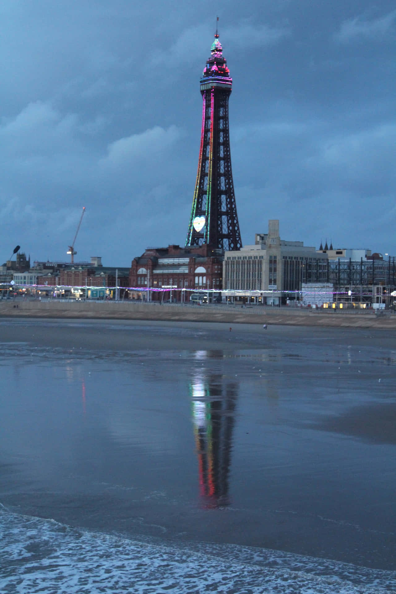 Blackpool Tower Beneath The Cloudy Sky Phone Background