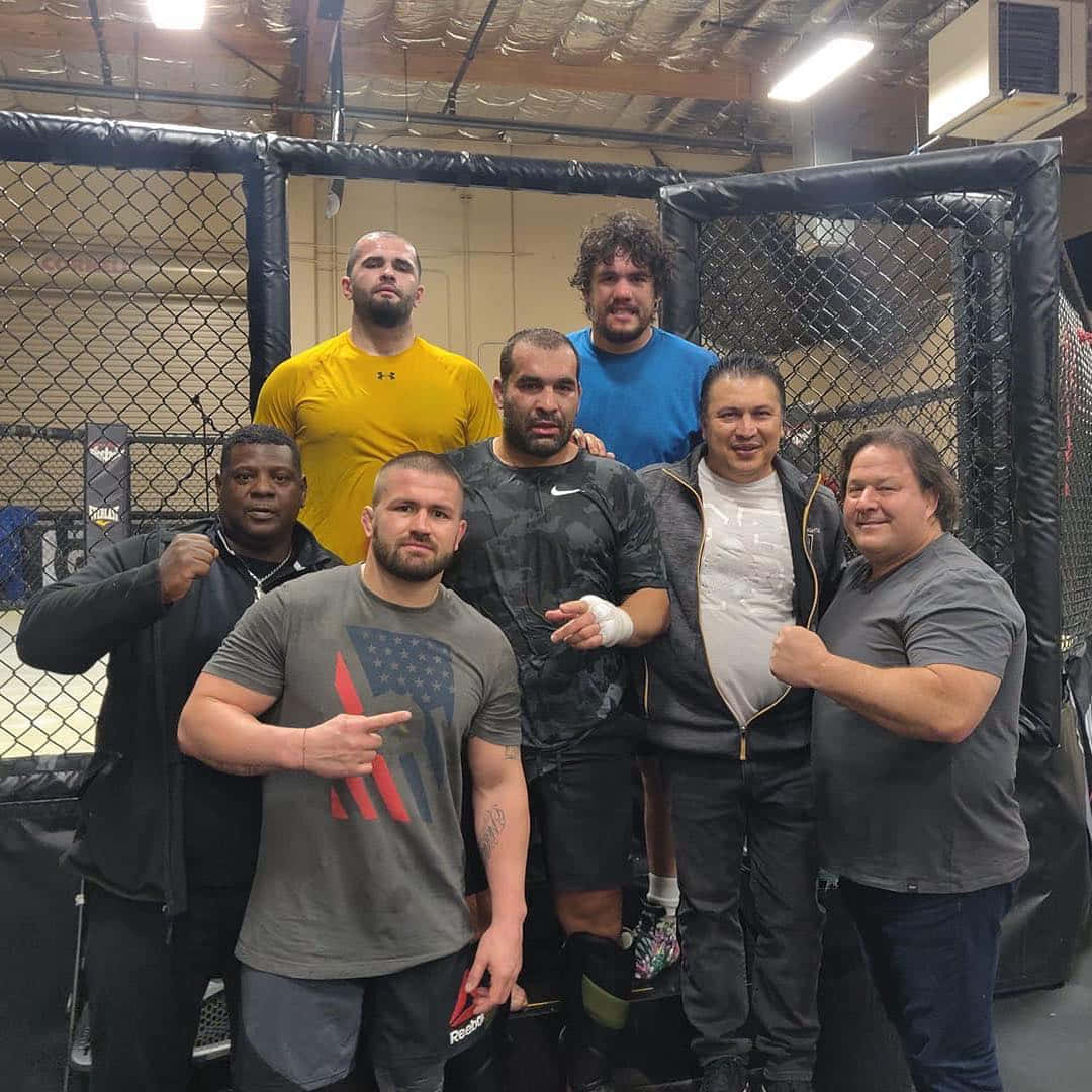 Blagoy Ivanov With Gym Friends Background