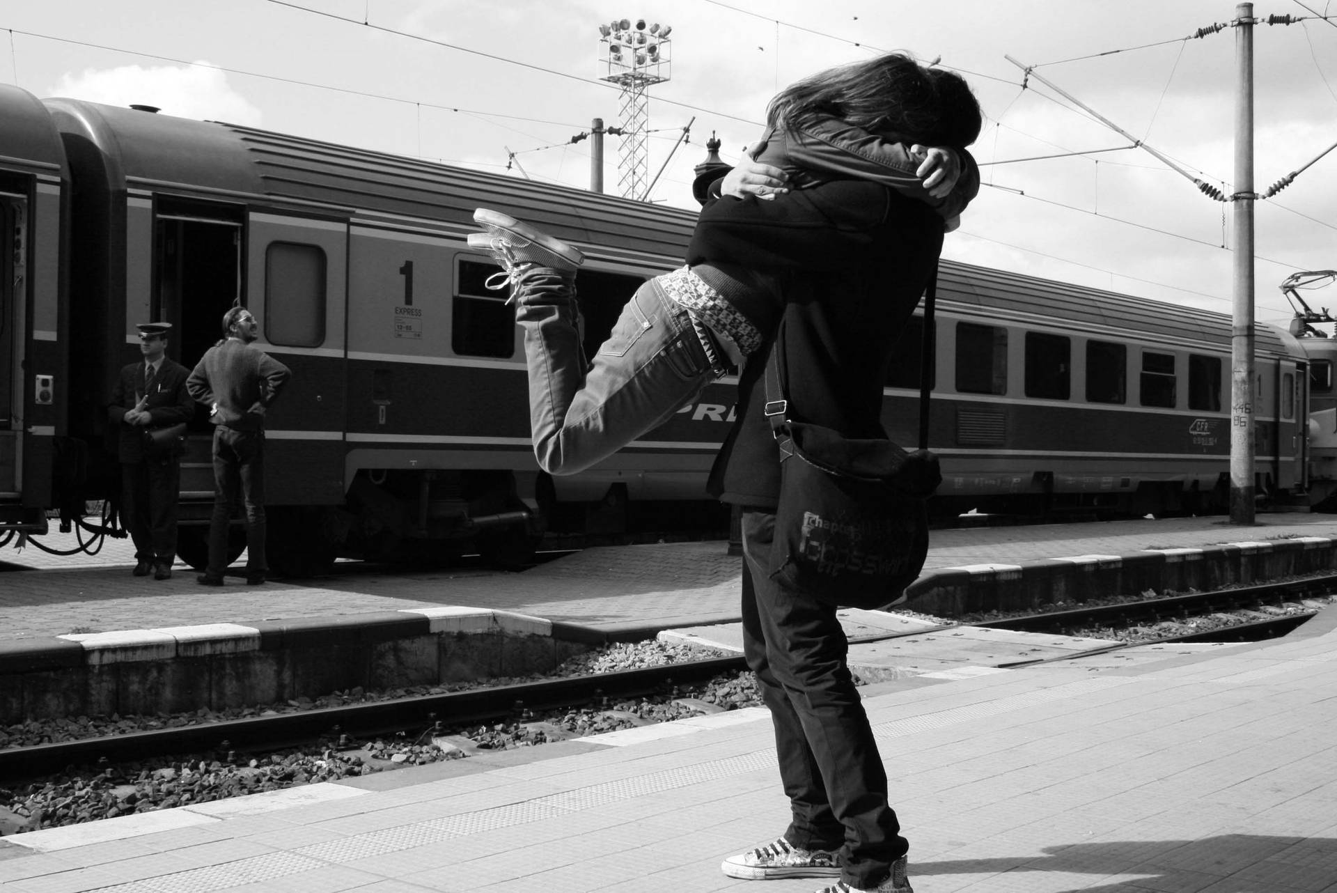 Blank And White Cute Couple By Train Background