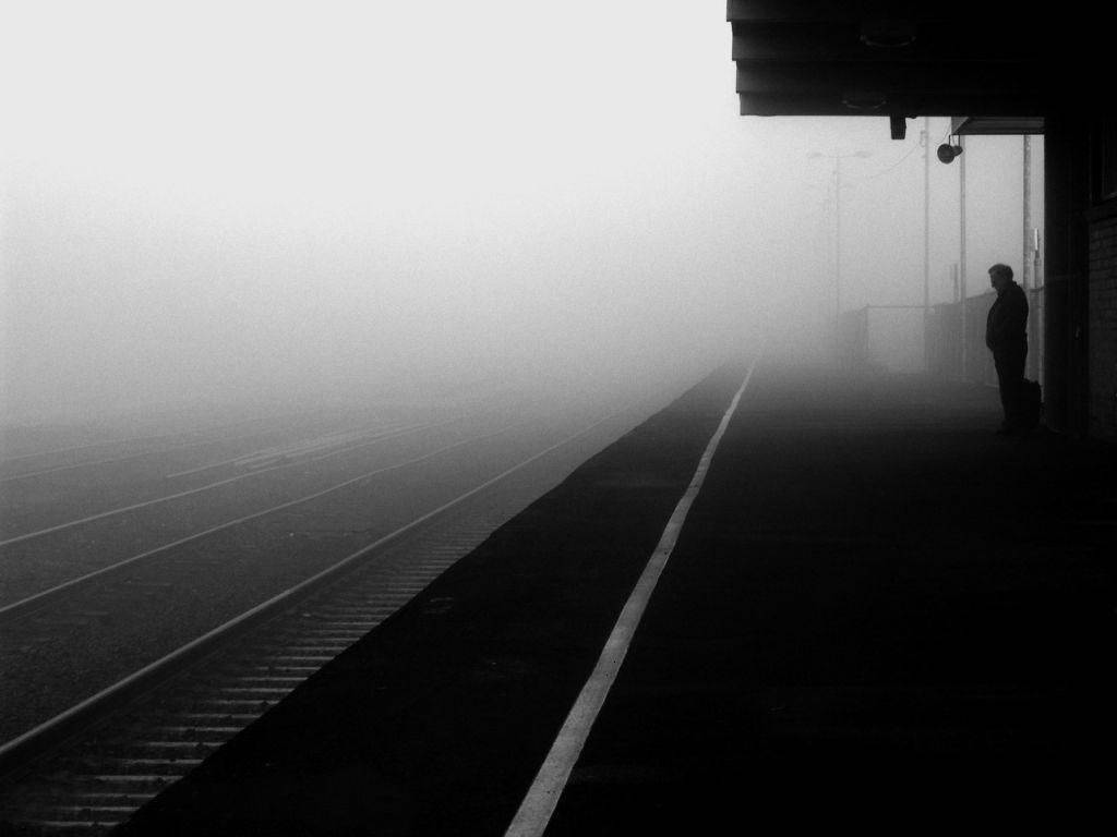 Blank And White Foggy Train Station