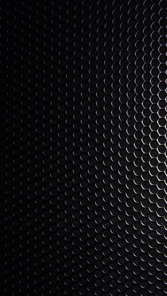 Blank Black Steel Plate With Holes Background