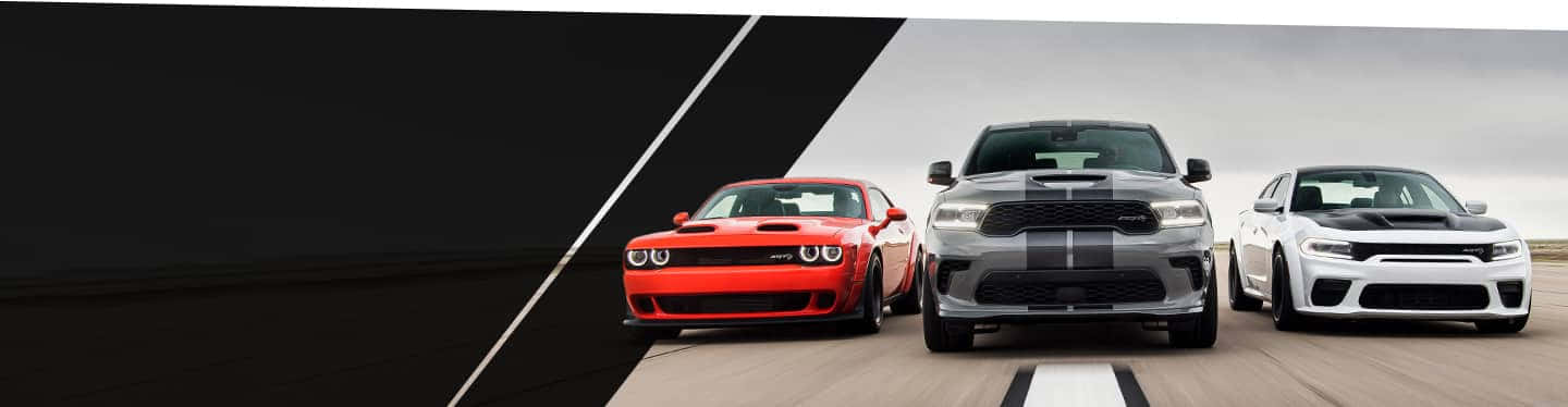 Blaze Your Own Trail In The Iconic Dodge Challenger Background