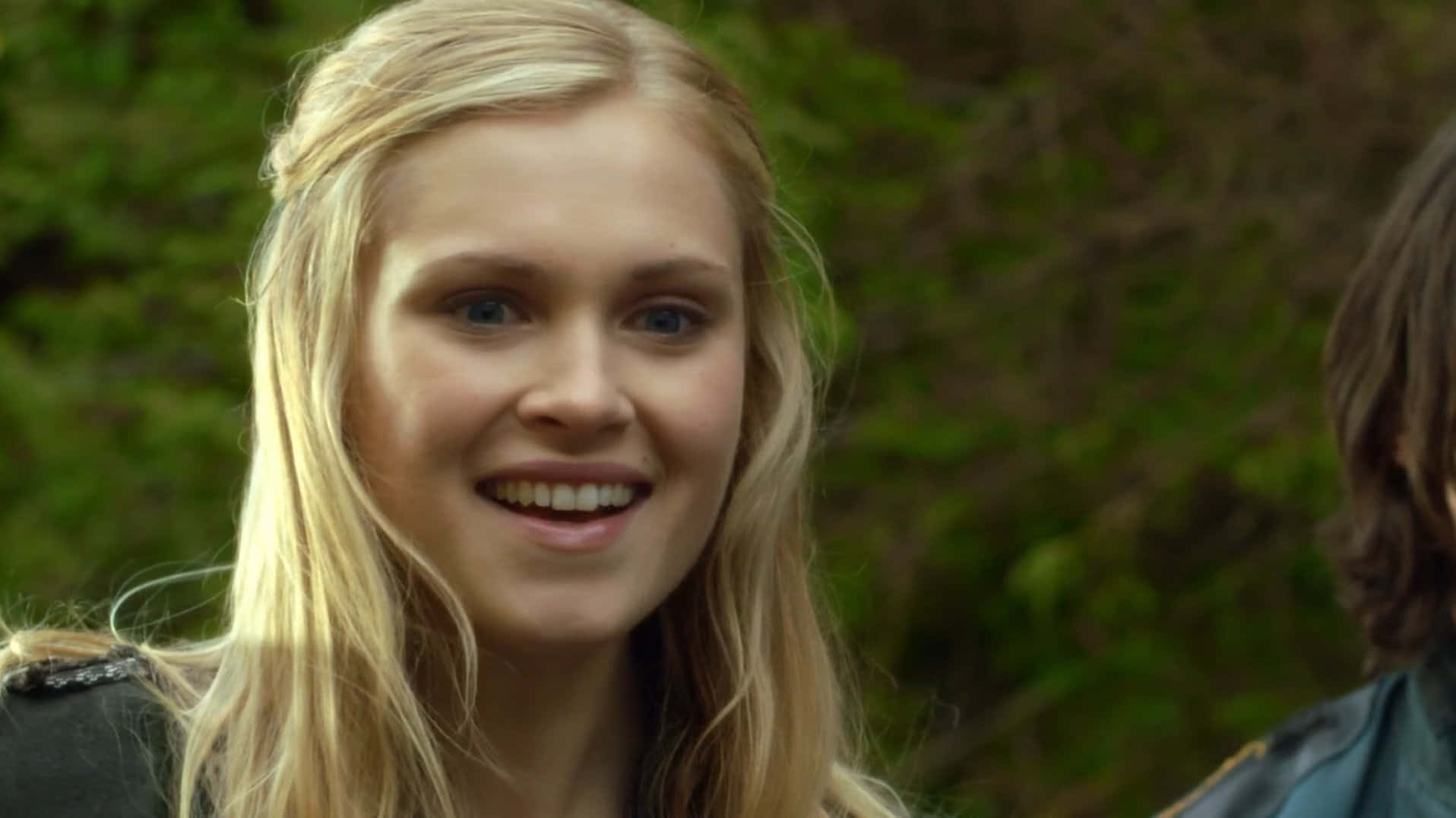 Blonde Actress Smiling Outdoors