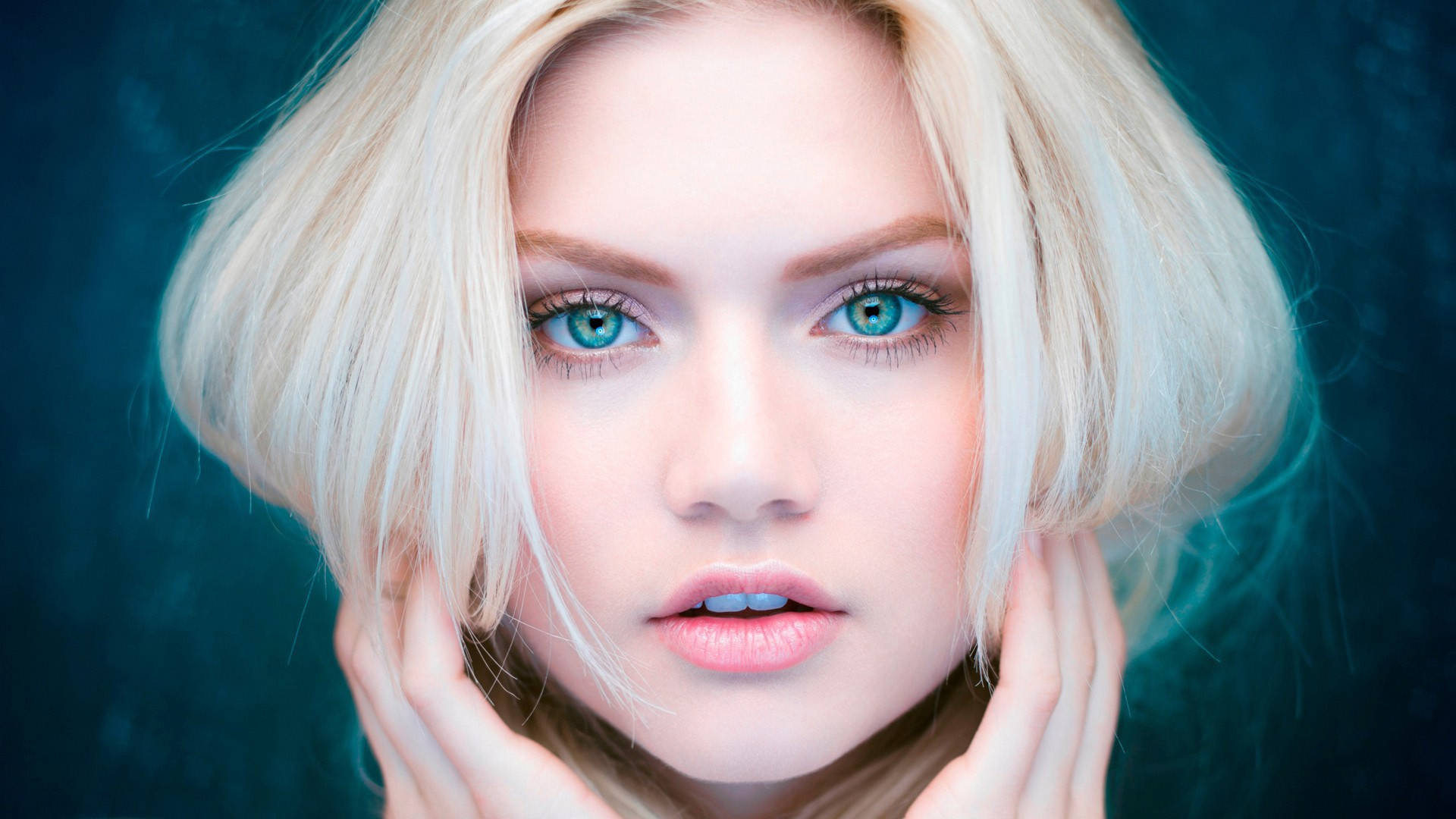 Blonde Female Model Head Teal Background