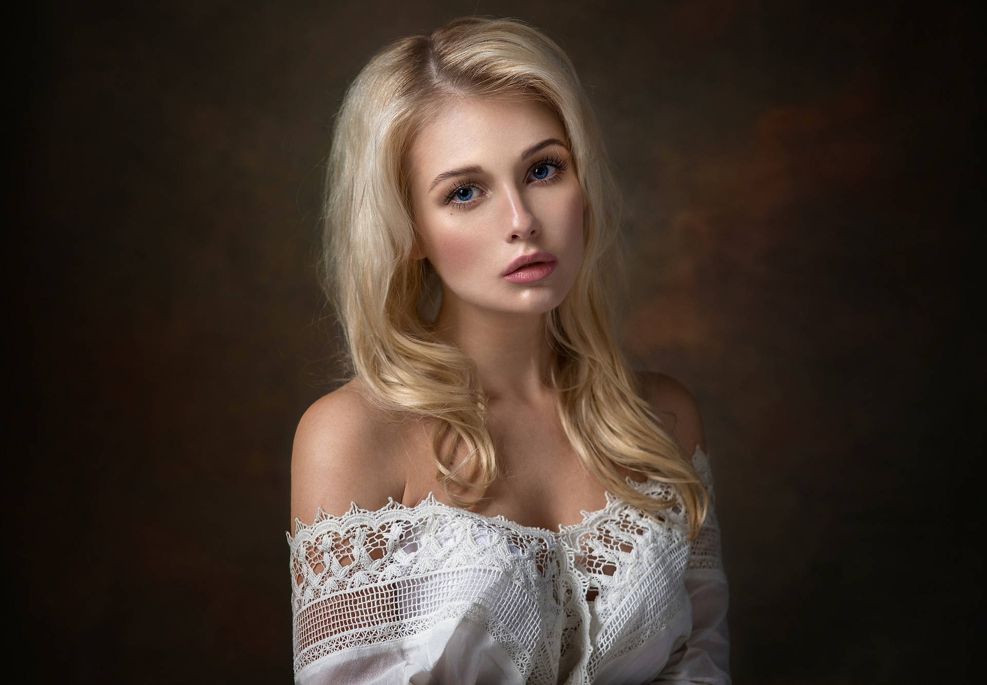 Blonde Female Model Painting Pouted Background