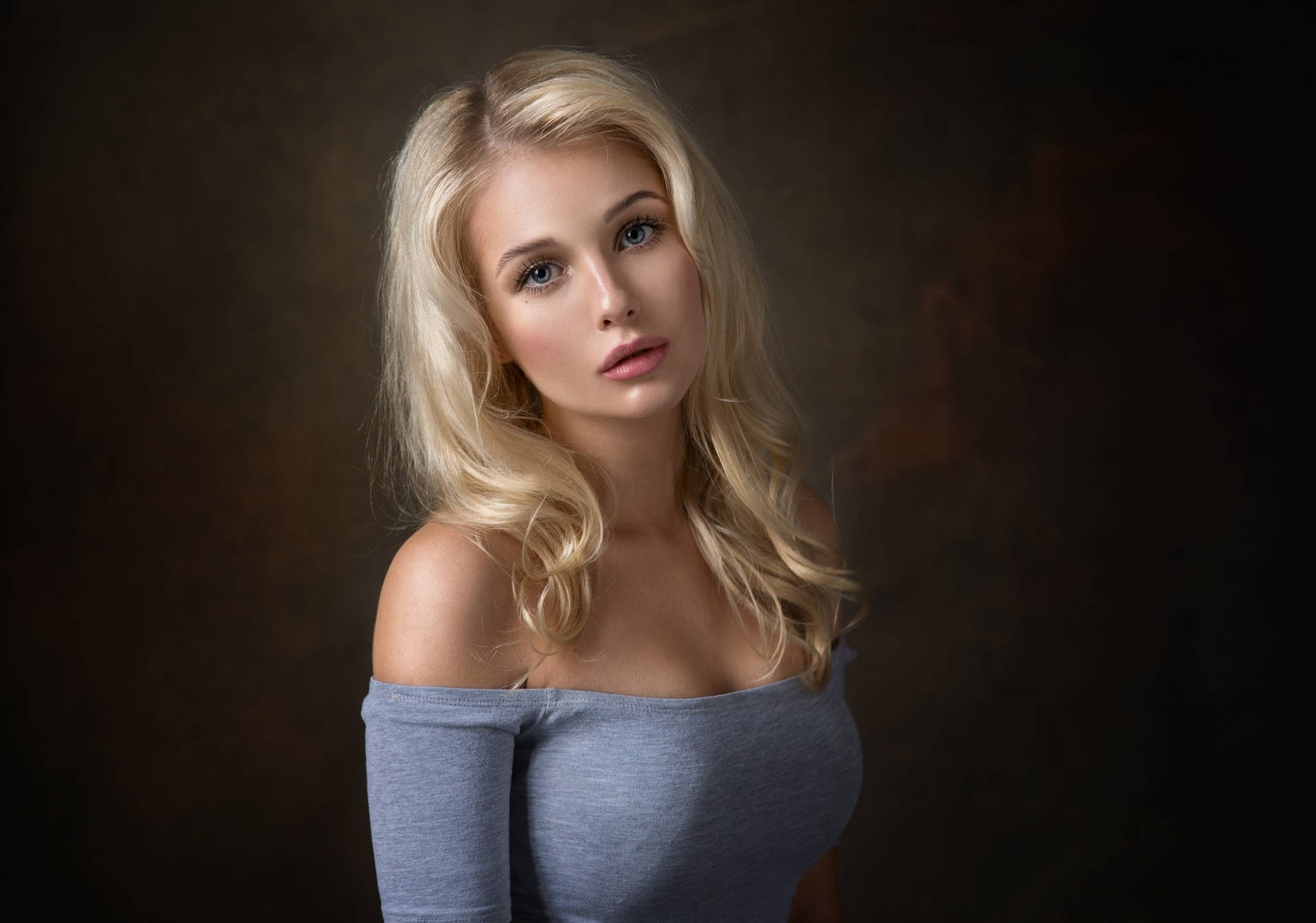 Blonde Female Model Pouty Face Background