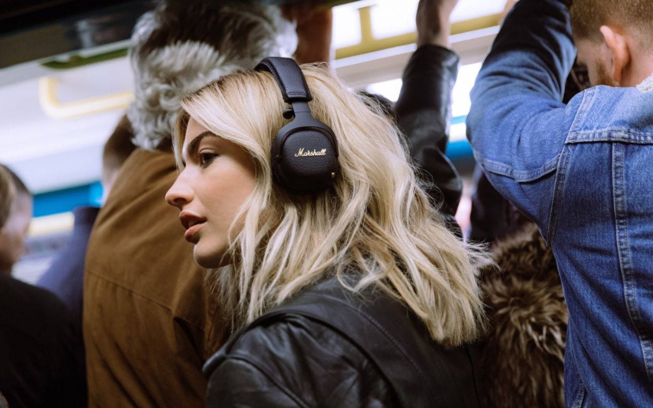 Blonde Girl Public Headphones Background