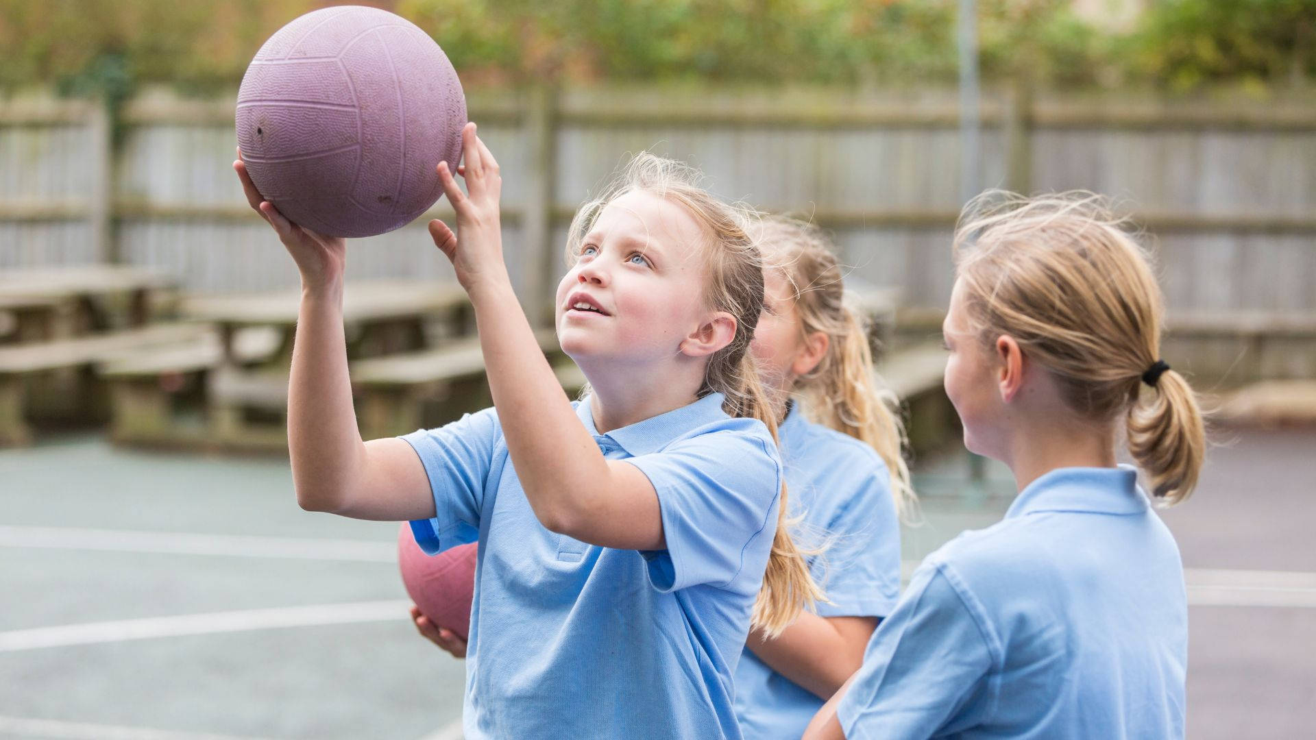 Blonde Girl Shoot Ball Netball