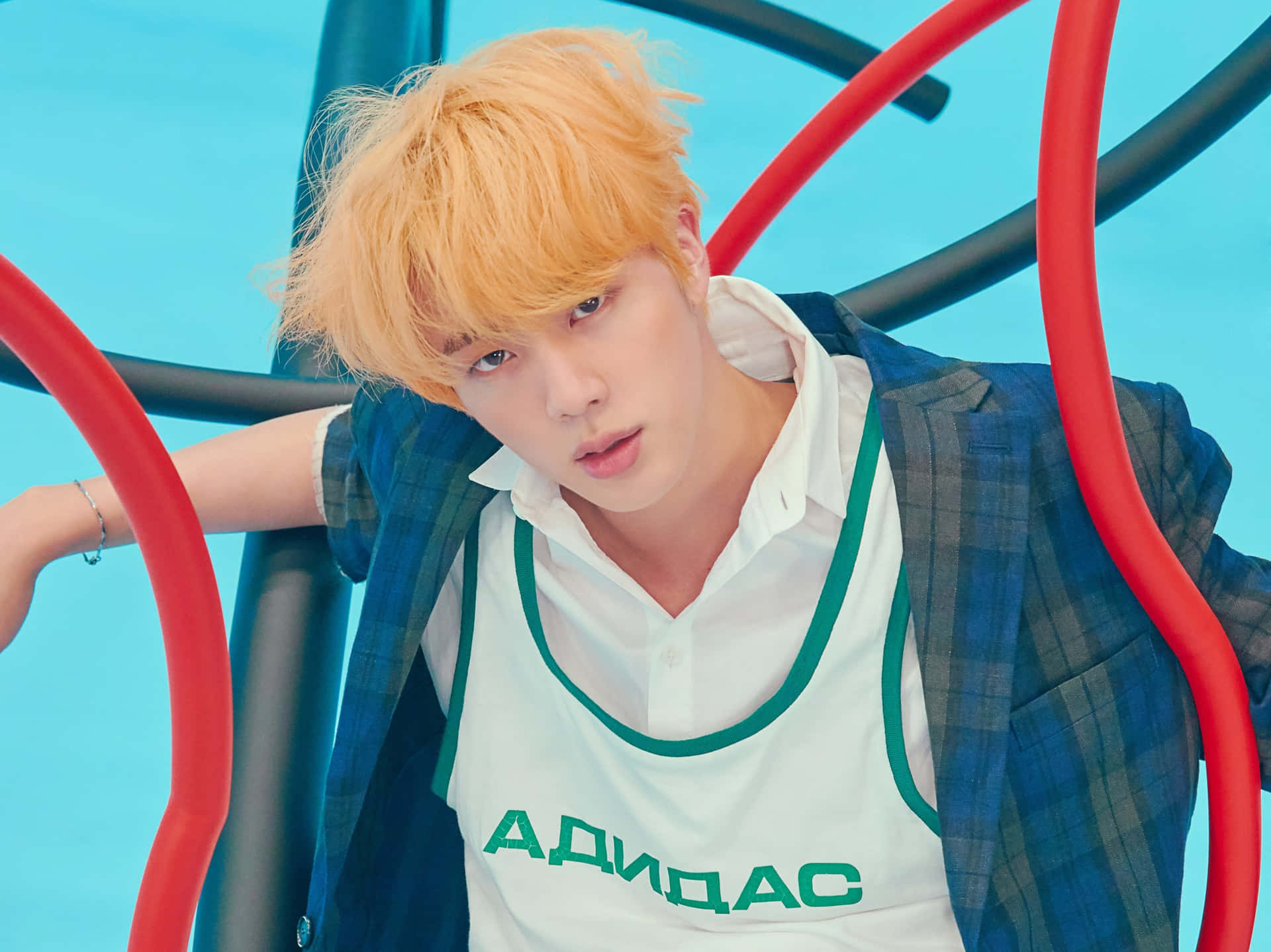 Blonde Haired Manin Sporty Outfit Background