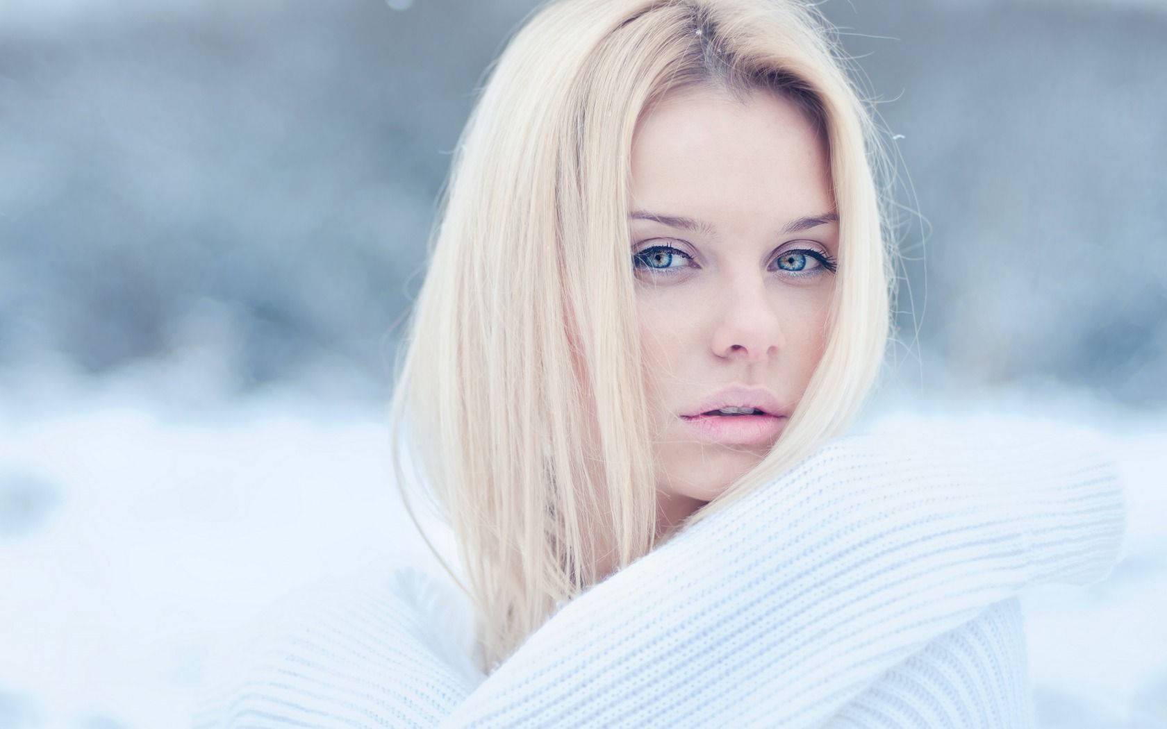 Blonde Russian Girl With Blue Eyes Background