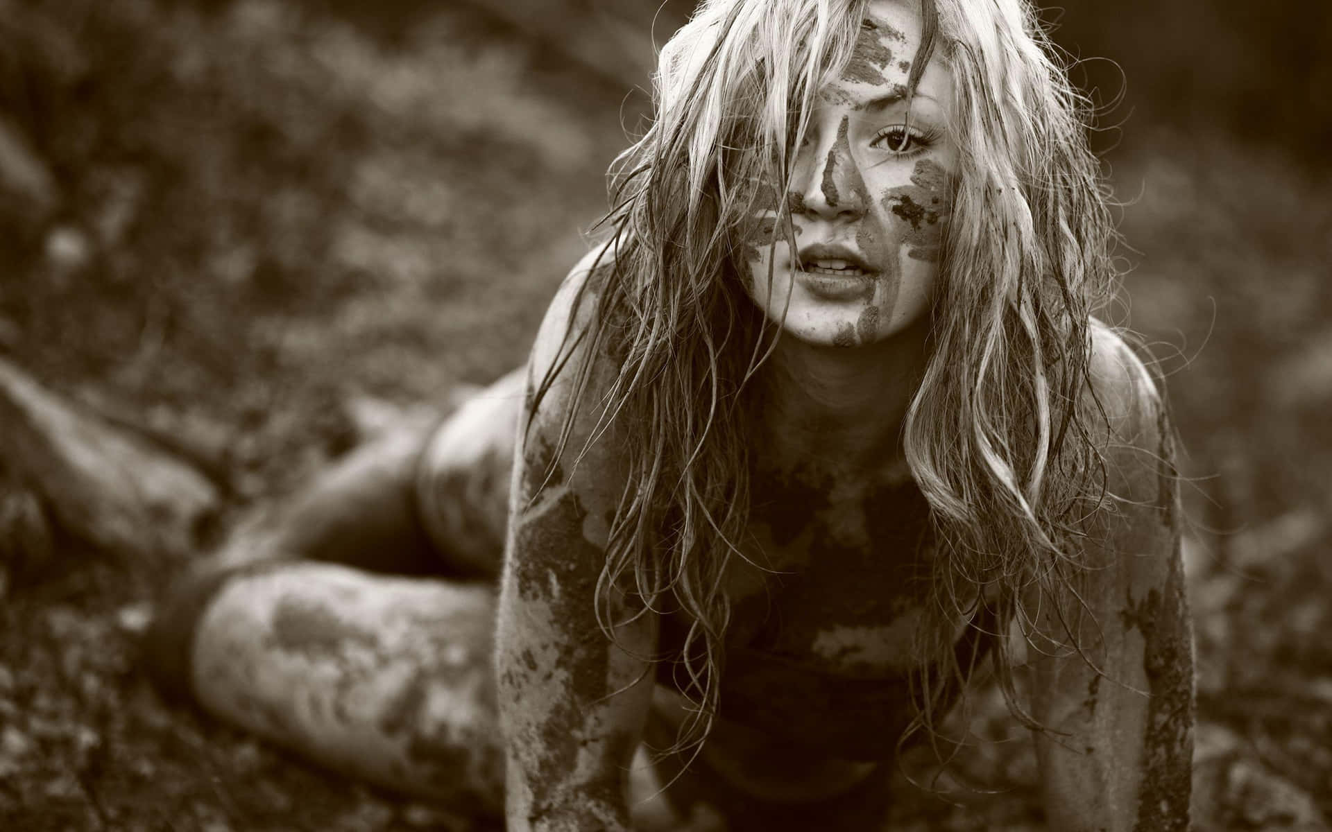 Blonde Woman Lying In Dirty Mud Sepia Background