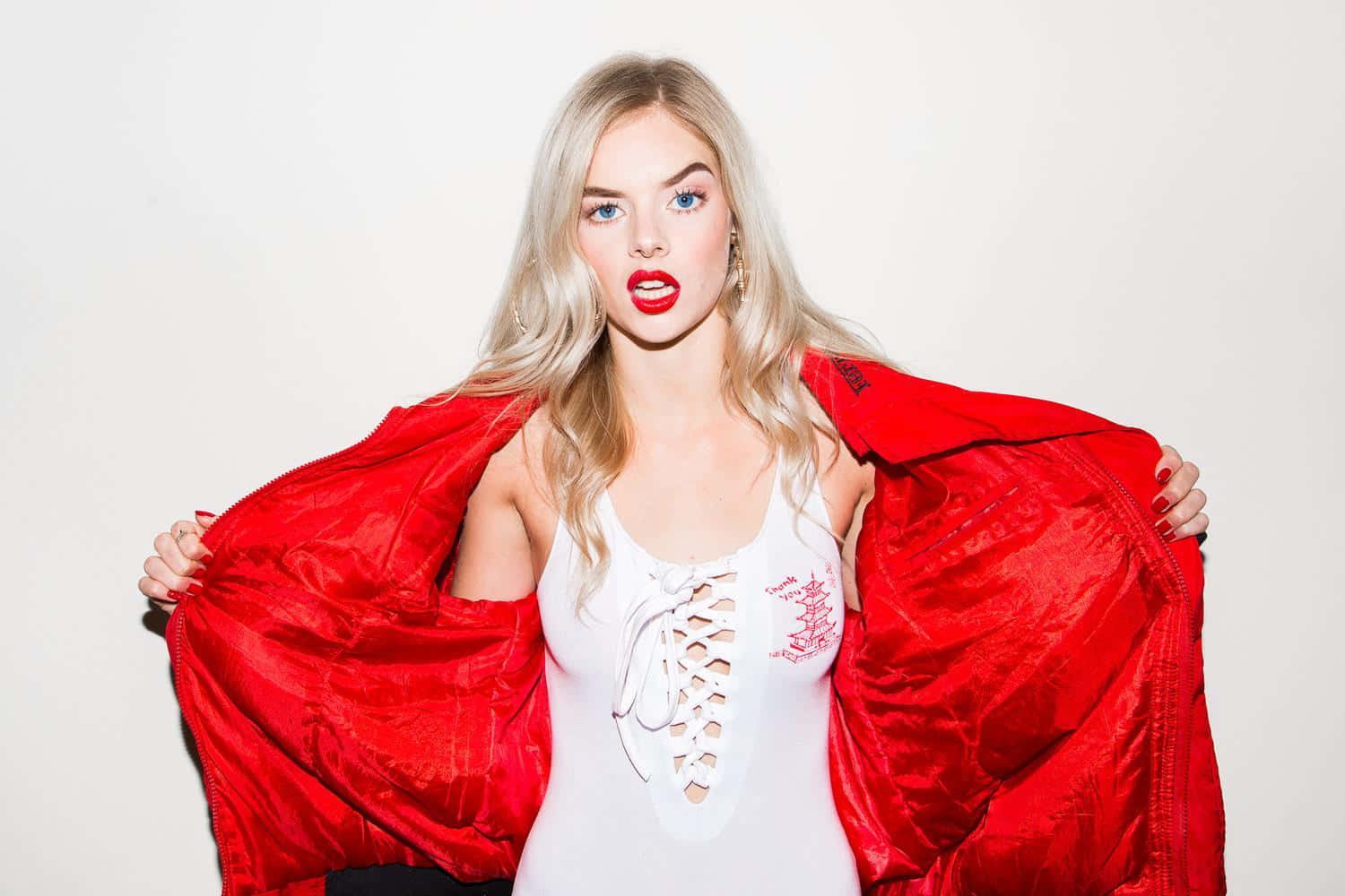 Blonde Woman Red Jacket White Top Background