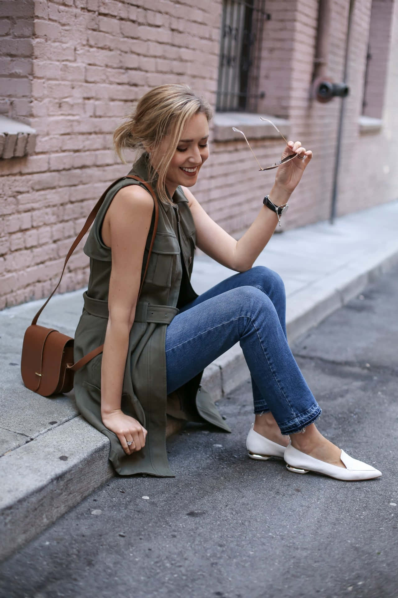 Blonde Woman With White Nicholas Kirkwood Flats Background