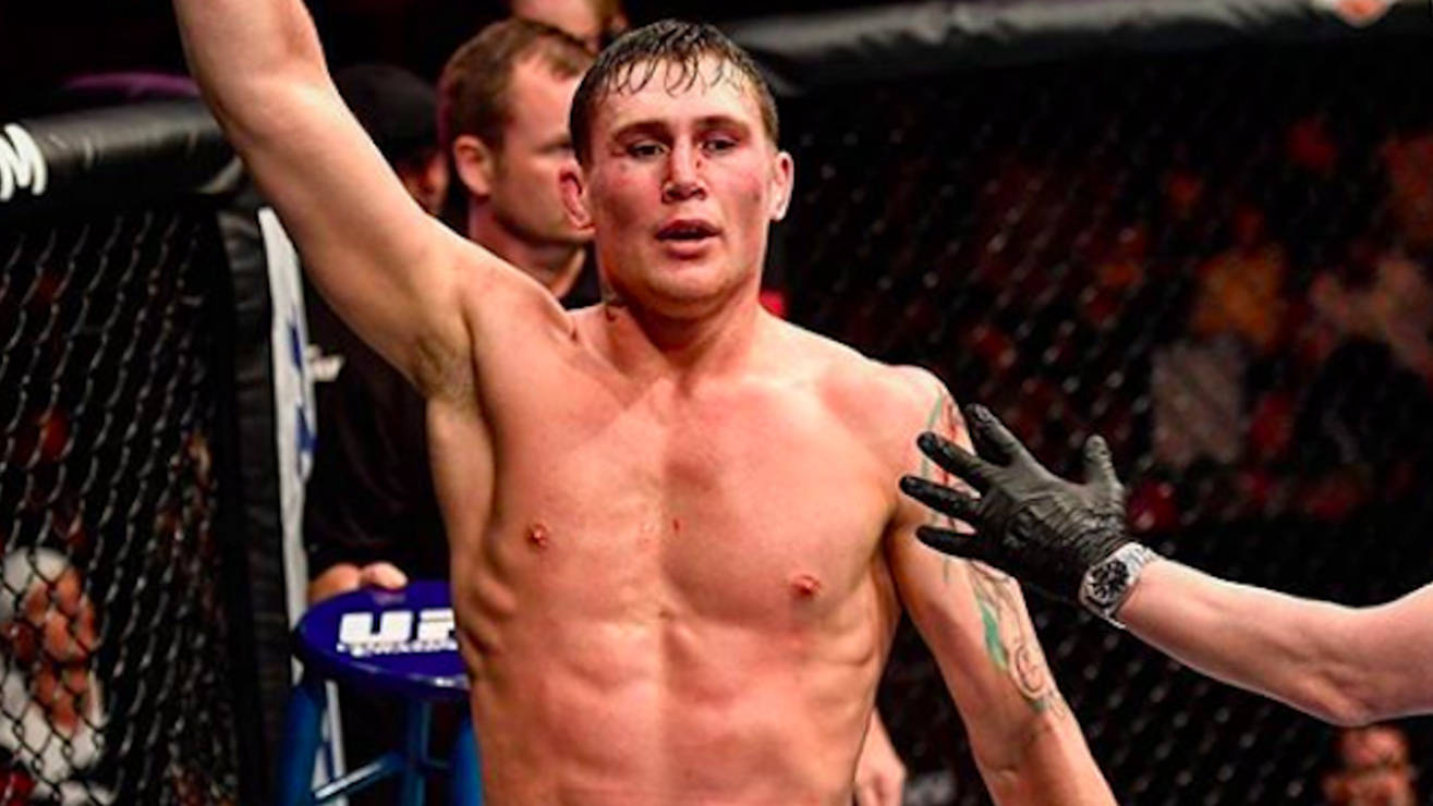 Bloodied Darren Till Winning Background