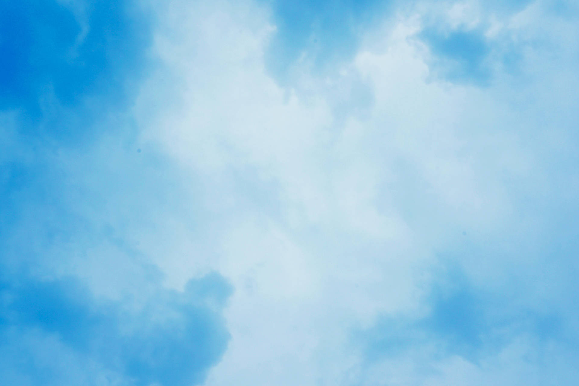Blue Abstract Sky And Clouds Background