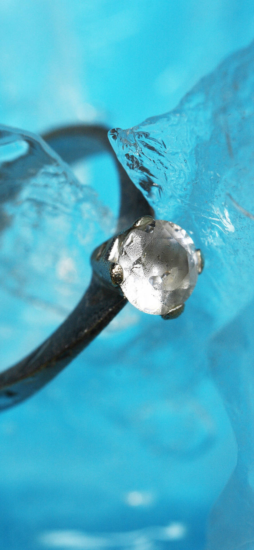 Blue Aesthetic Ring In Water Background