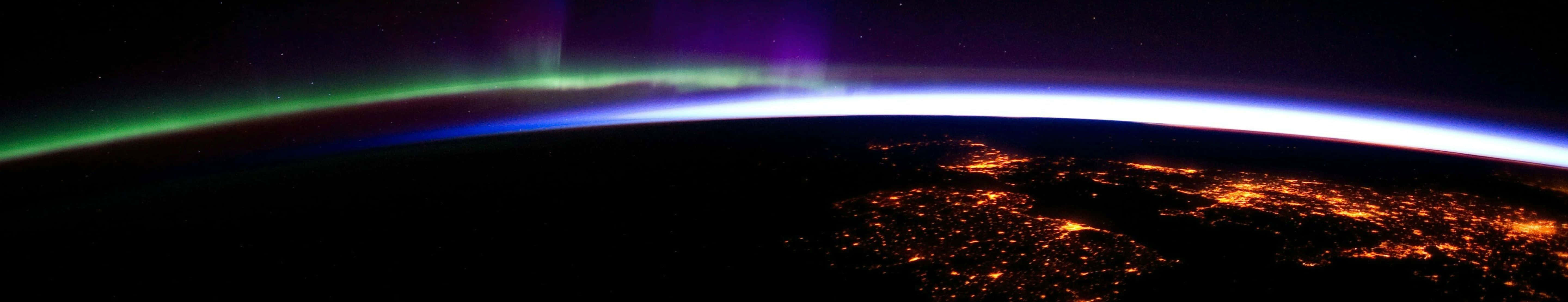 Blue And Green Planet Dark Triple Monitor Background