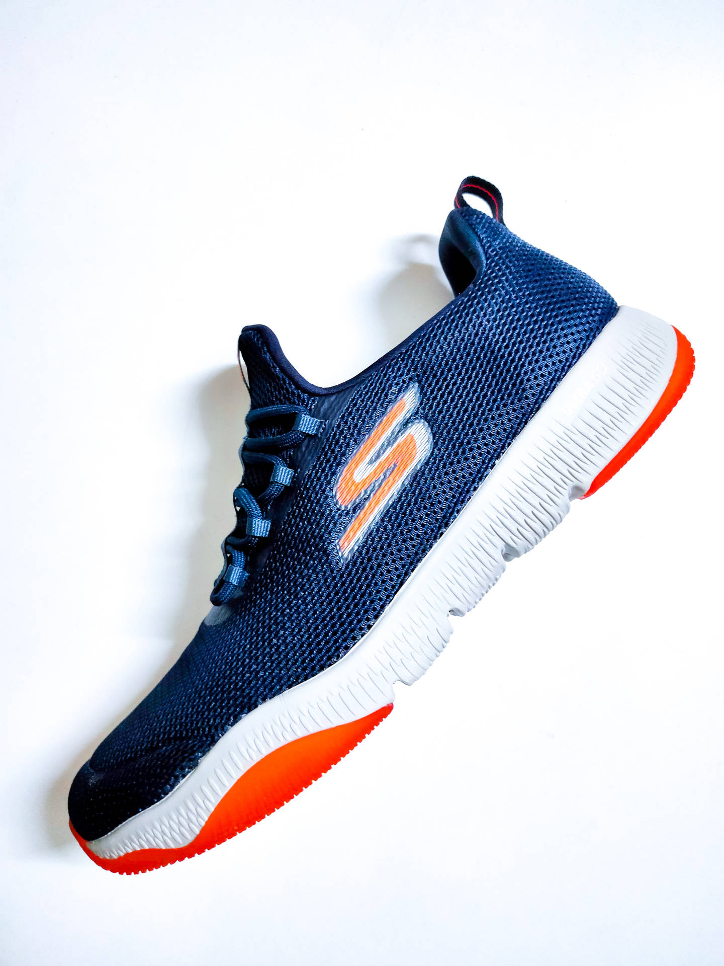 Blue And Orange Skechers Background