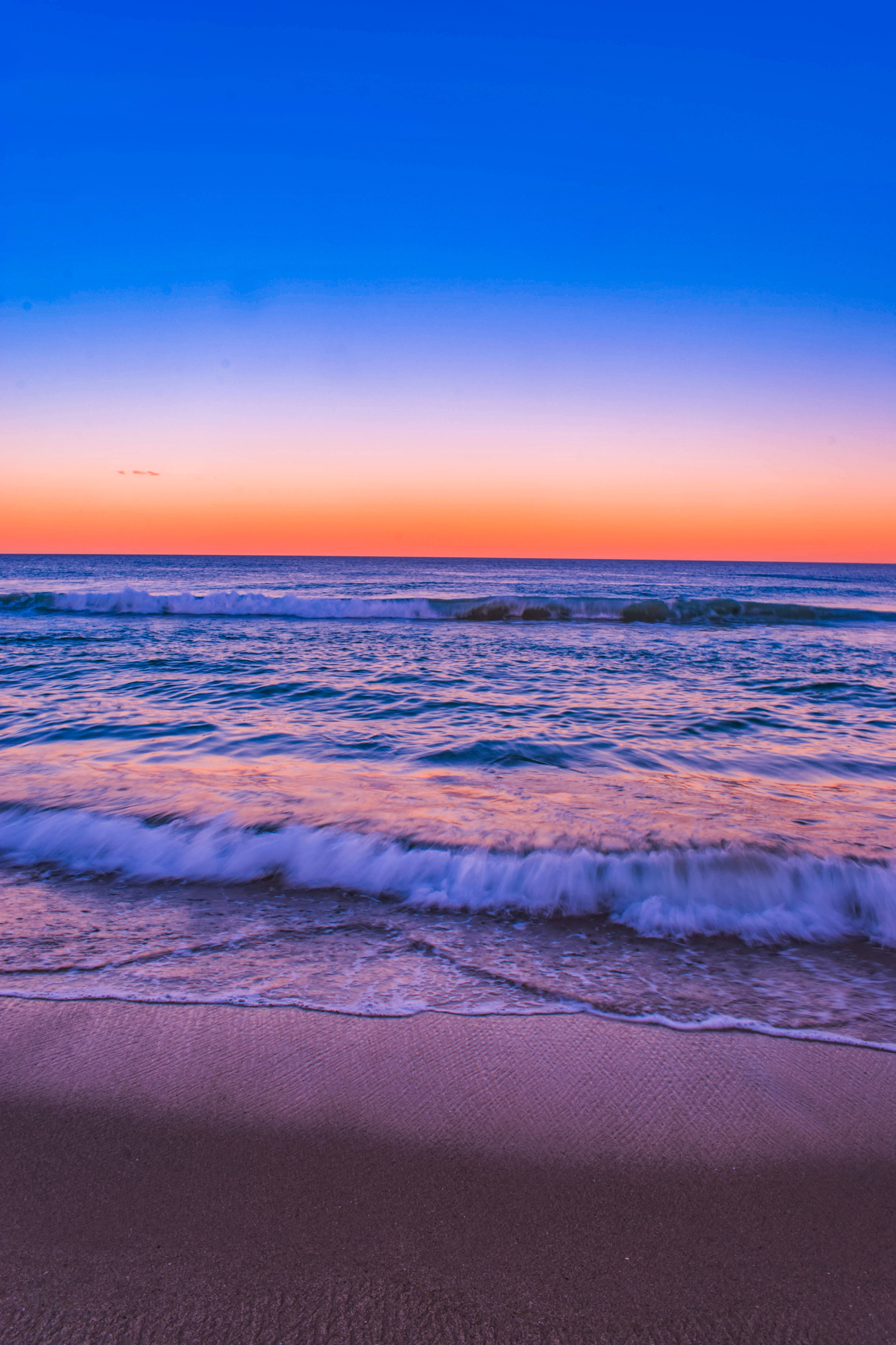 Blue And Orange Sunset Beach Android Background