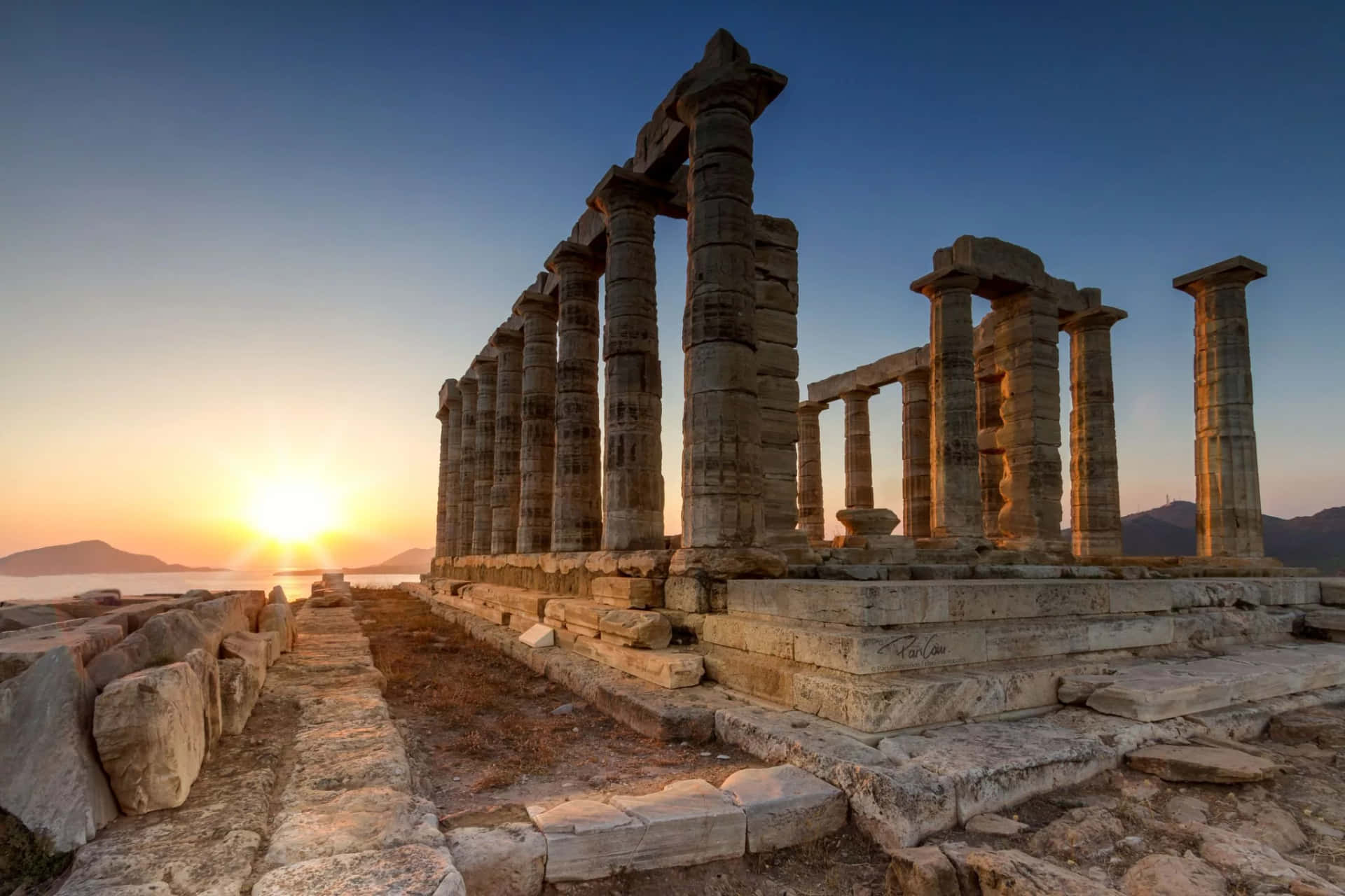 Blue And Orange Sunset Sounion Background