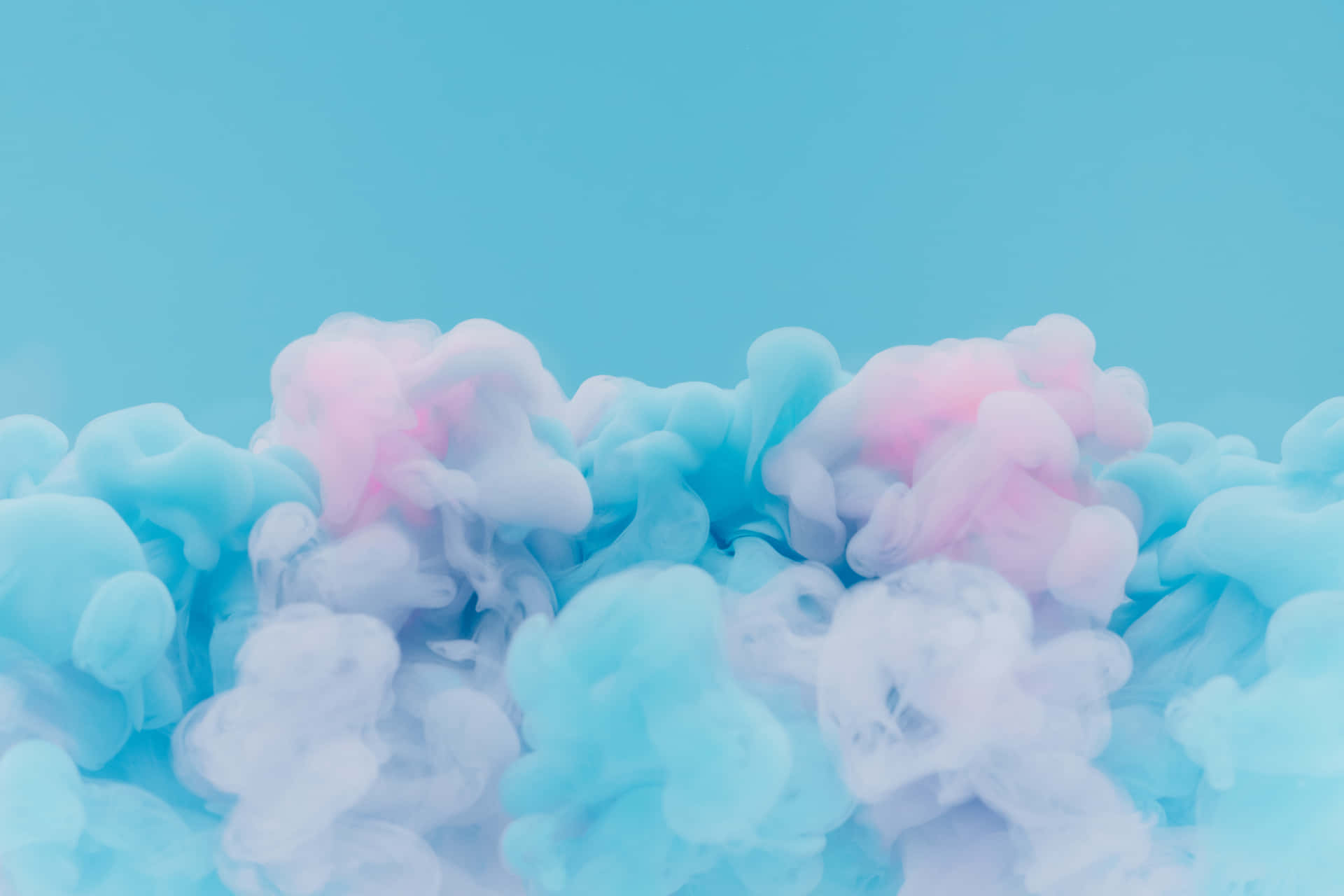 Blue And Pink Smoke On A Blue Background Background