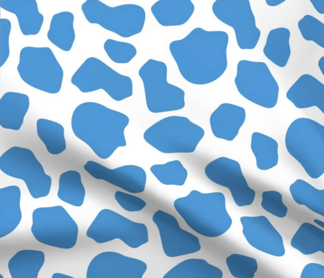 Blue And White Cow Print Fabric Background