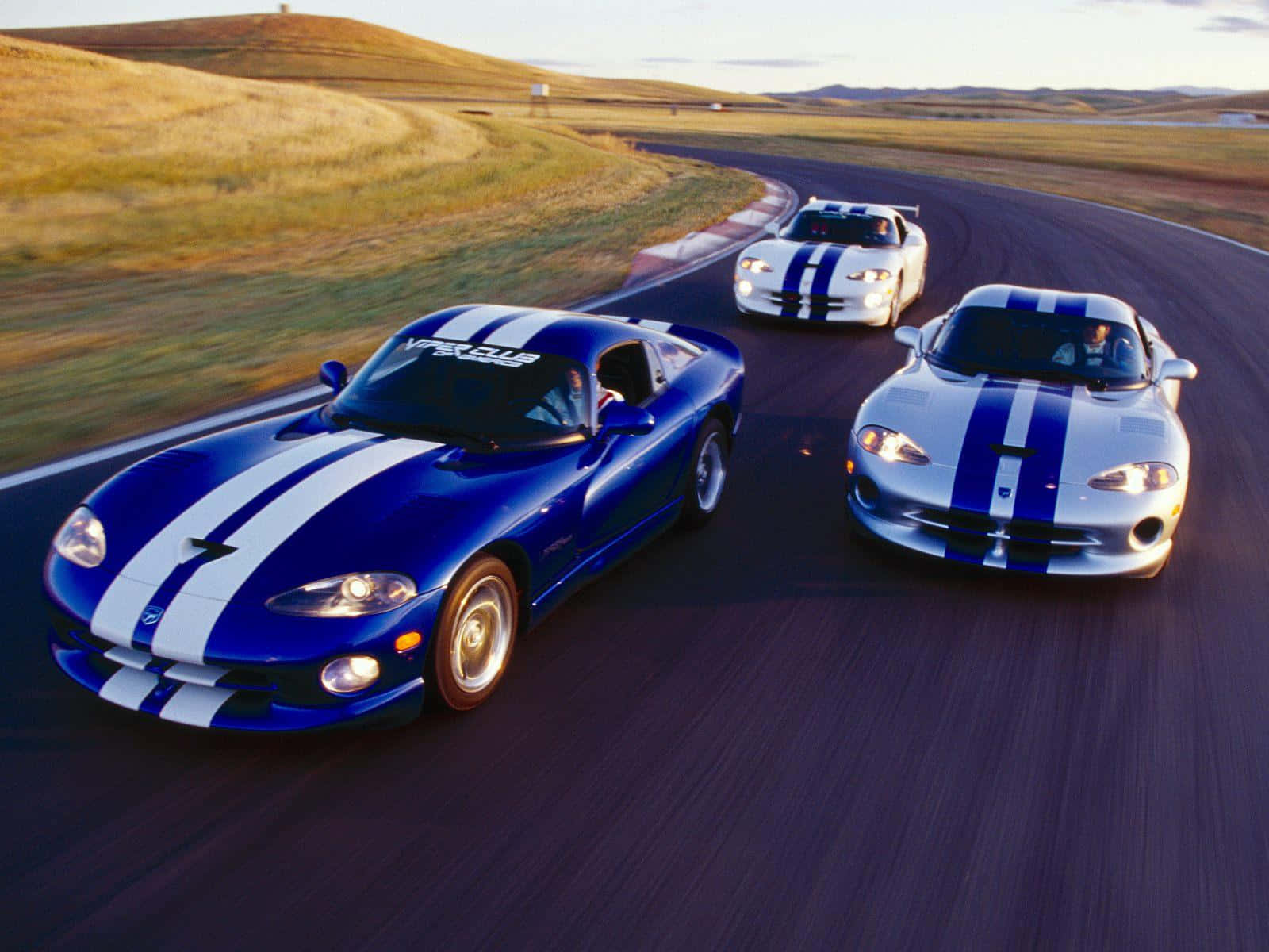 Blue And White Dodge Vipers Background