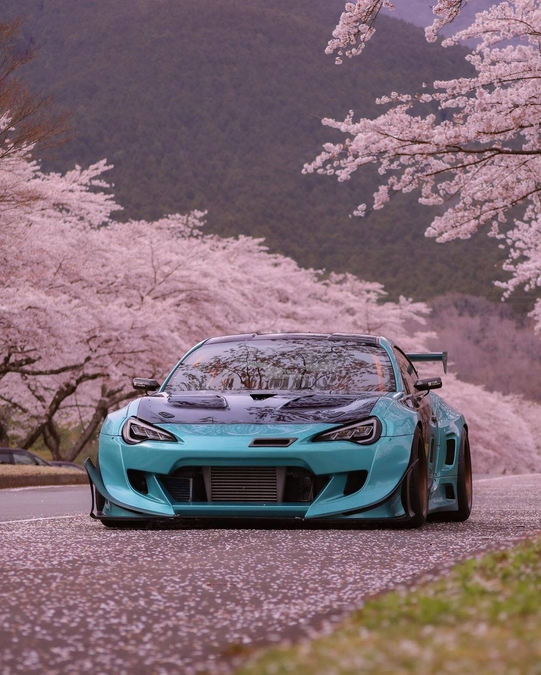 Blue Auto Racing Car Background