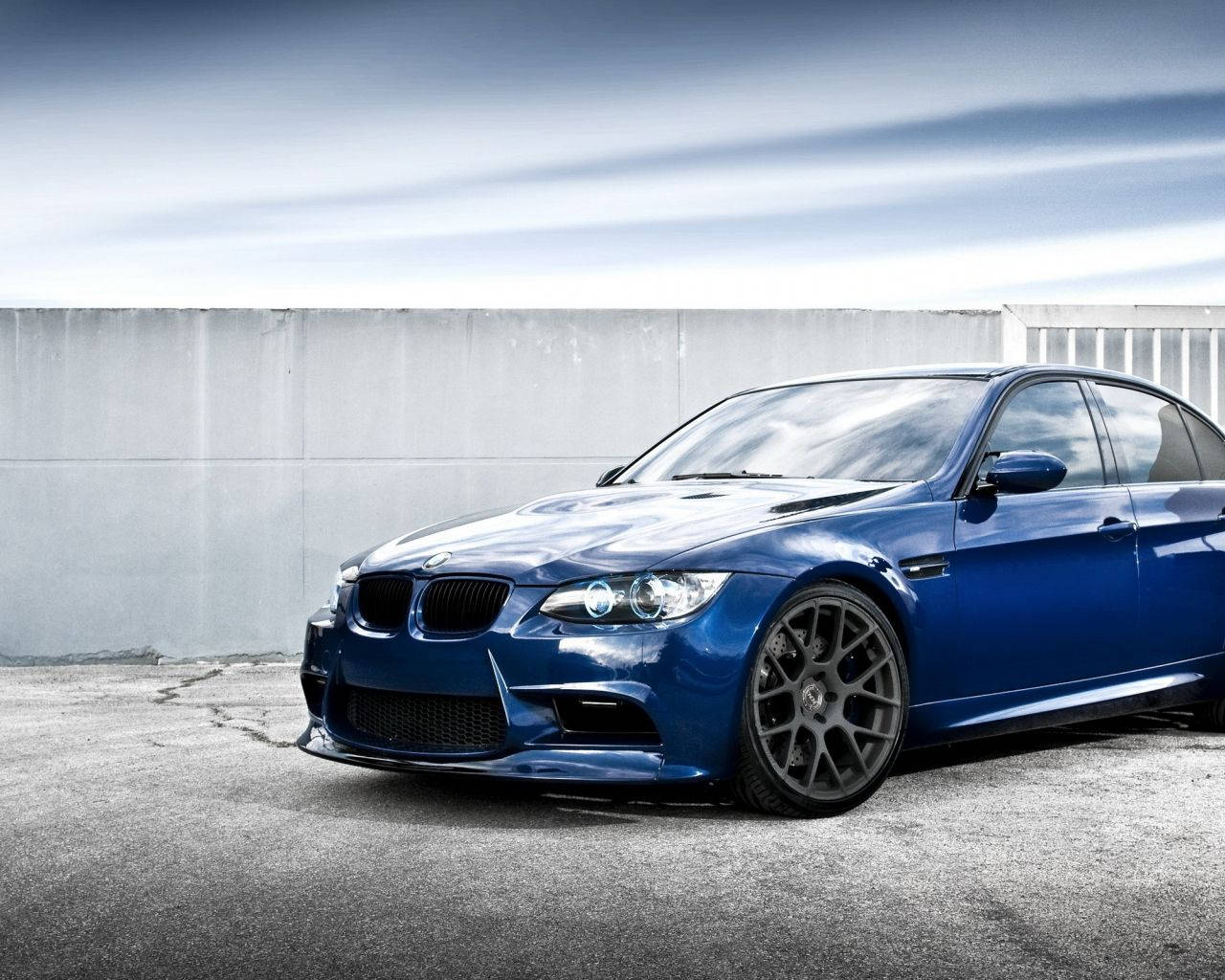 Blue Bmw In A Roof Deck