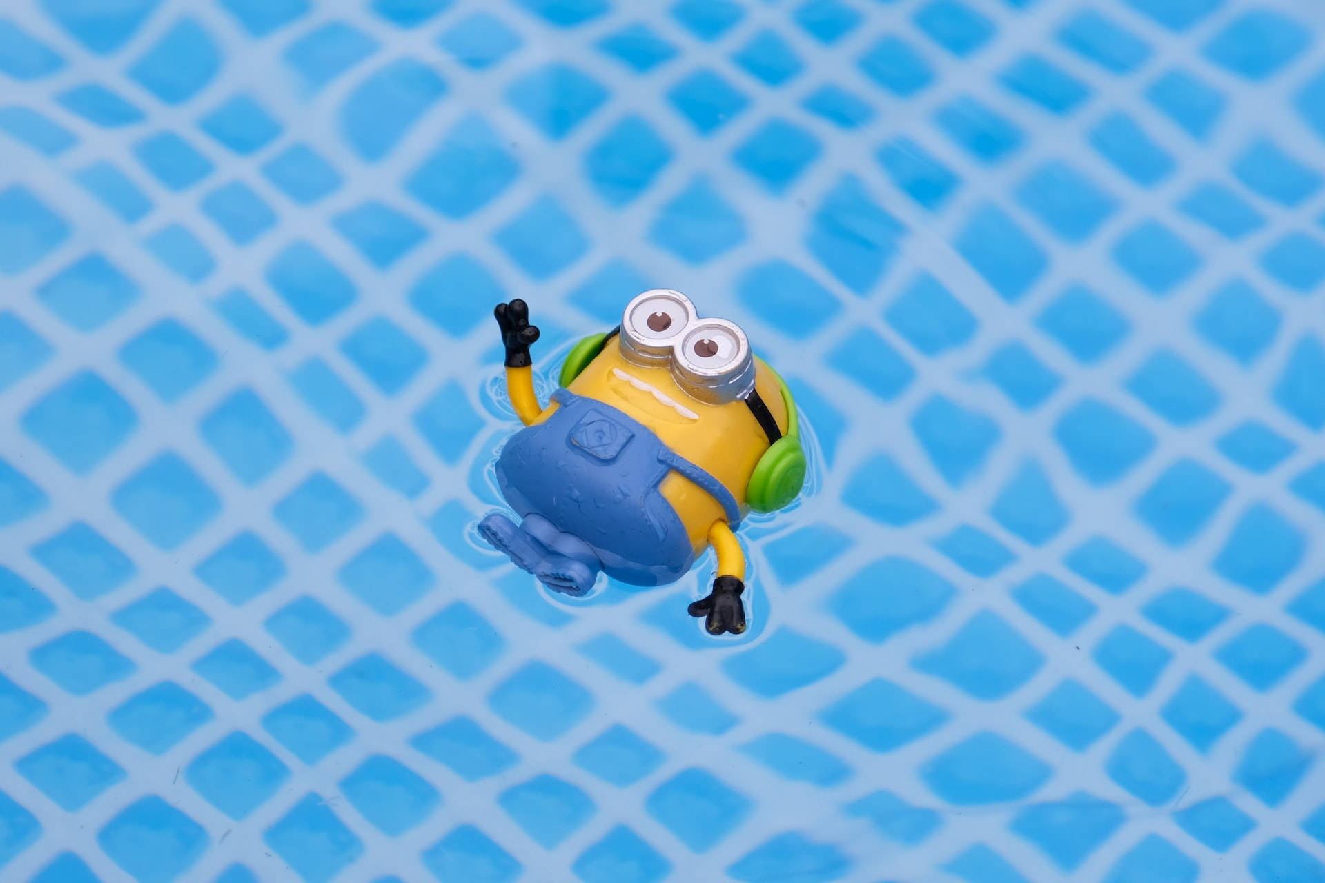 Blue Checkered And Minion Background