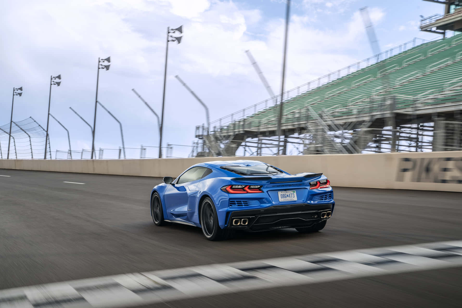 Blue_ Corvette_ C8_ Racing_ On_ Track.jpg Background