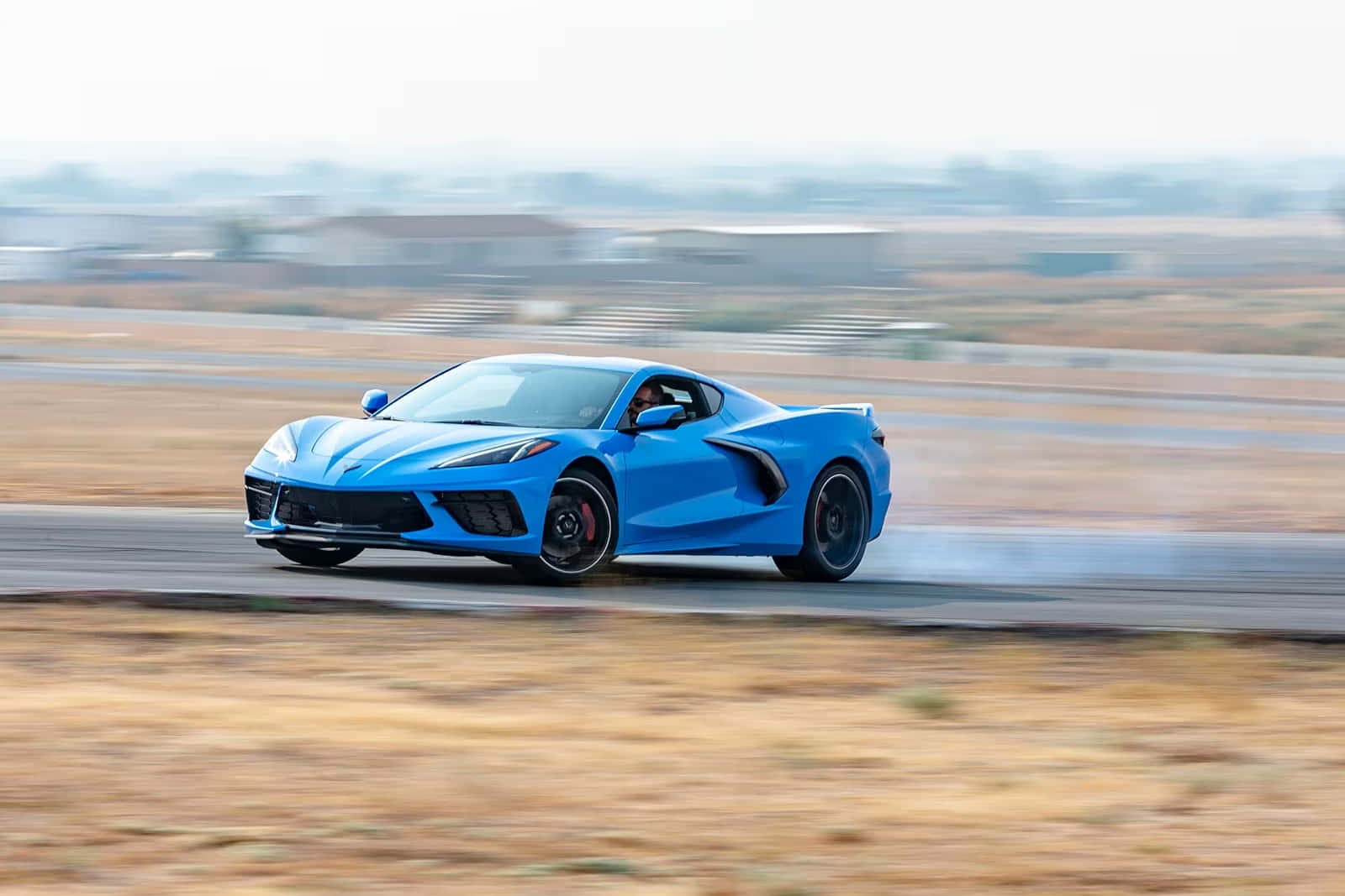 Blue Corvette C8 Speedingon Track.jpg