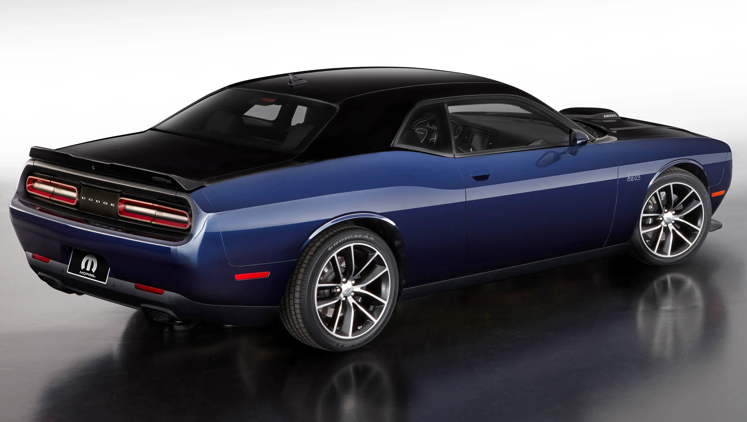 Blue Dodge Challenger In A Showroom Background