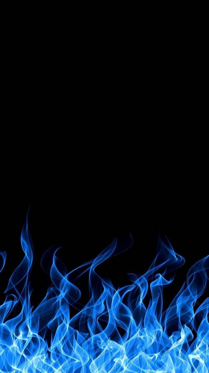 Blue Fire On A Black Background Background