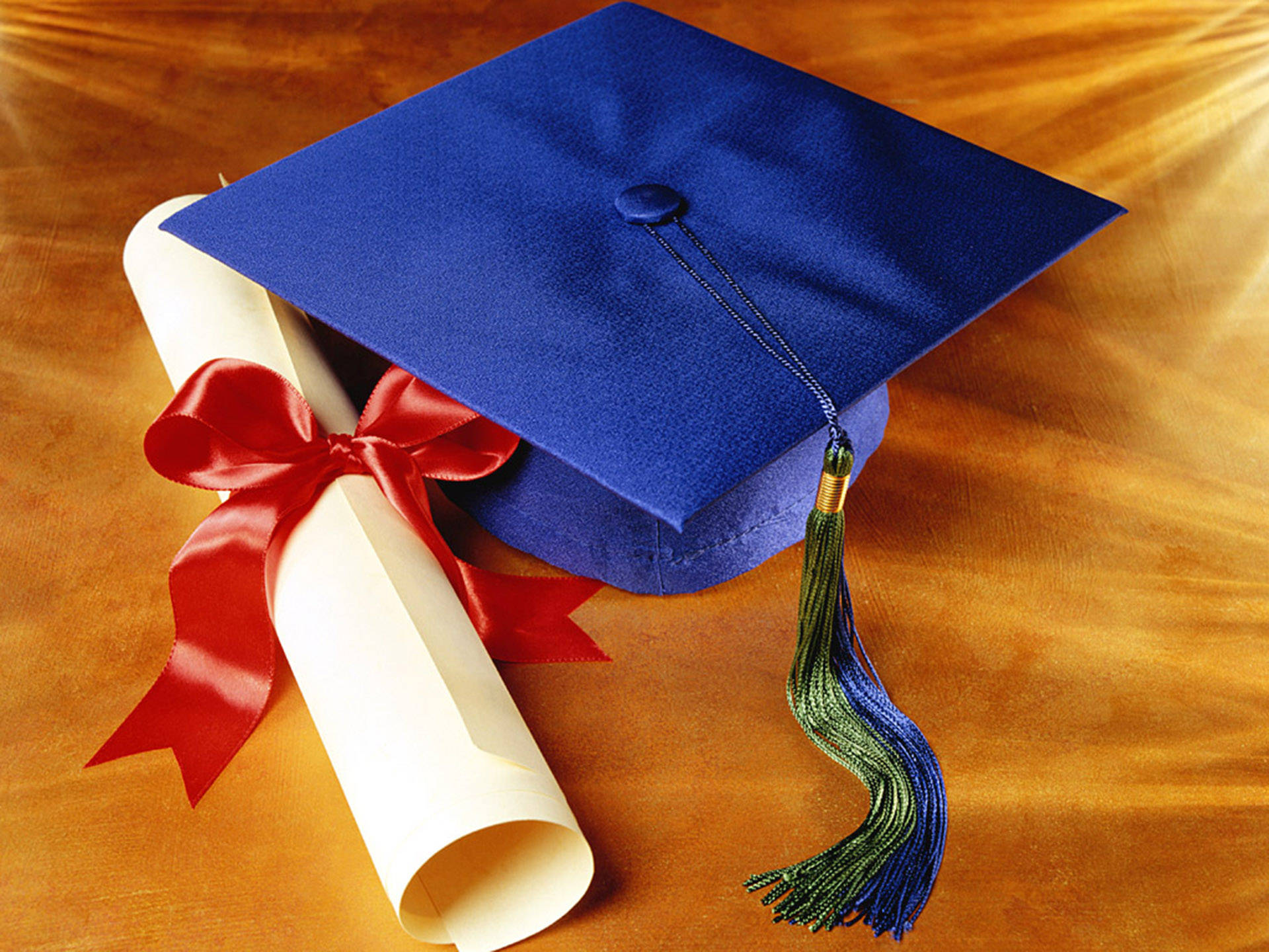 Blue Graduation Cap And Diploma Background