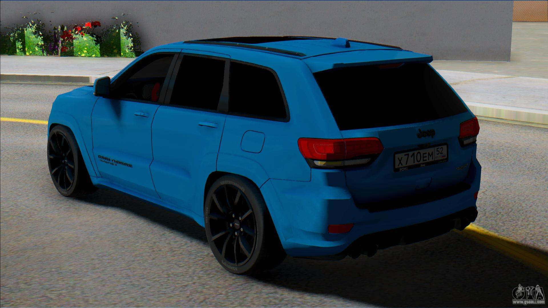 Blue Jeep Trackhawk On Road Background