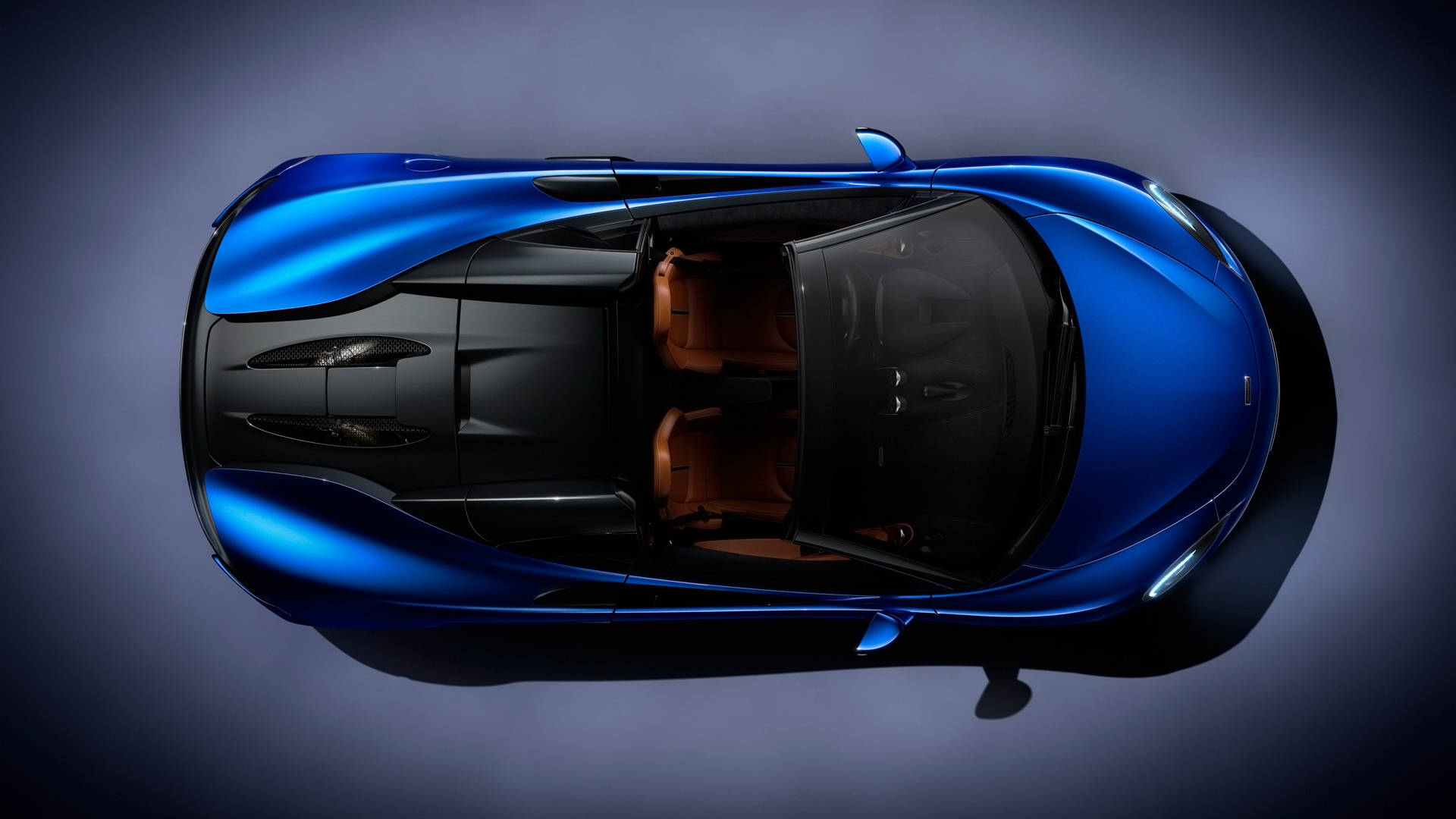 Blue Mclaren Spyder Overhead Shot Background