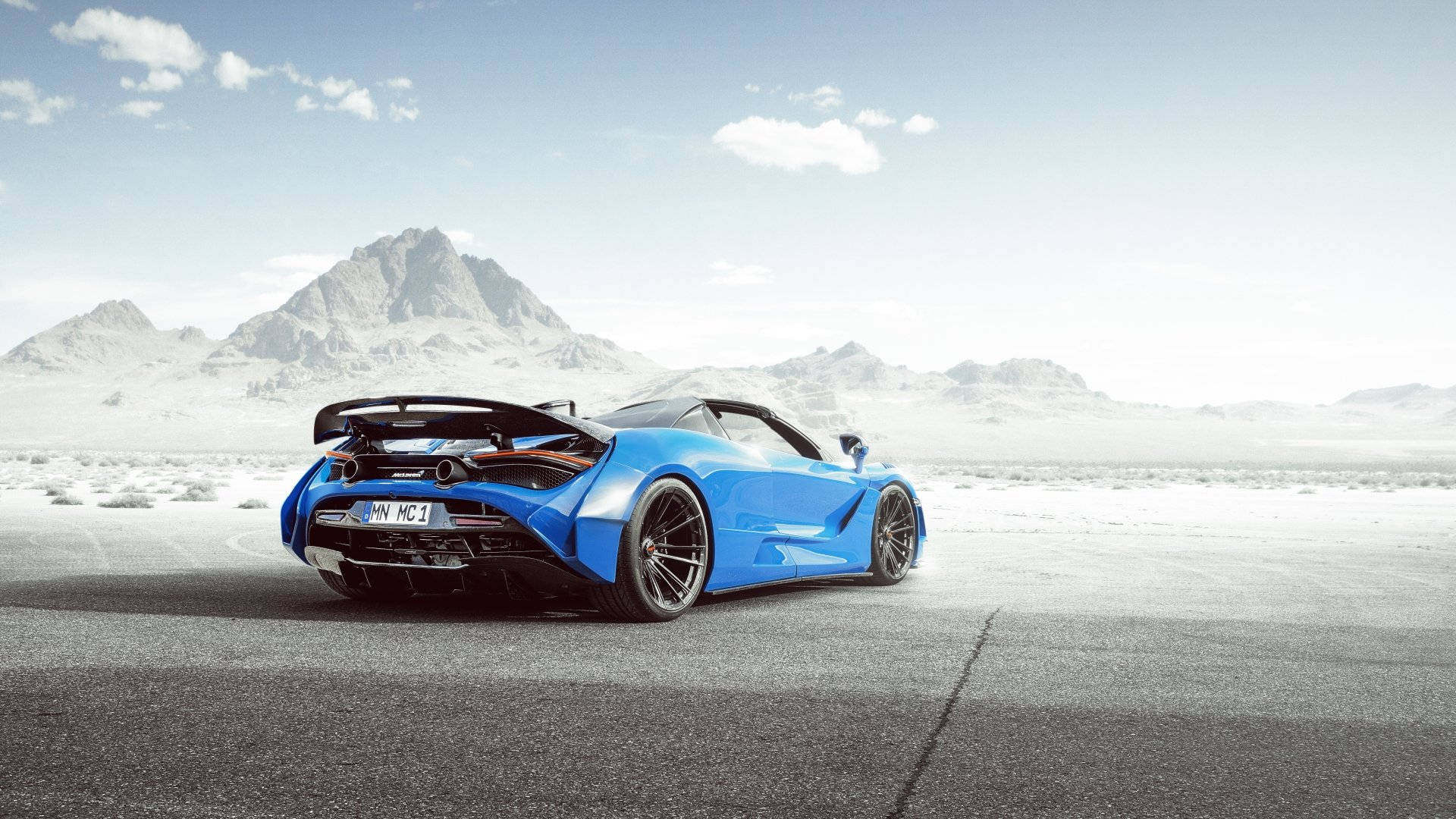 Blue Mclaren Spyder Rear Shot Background