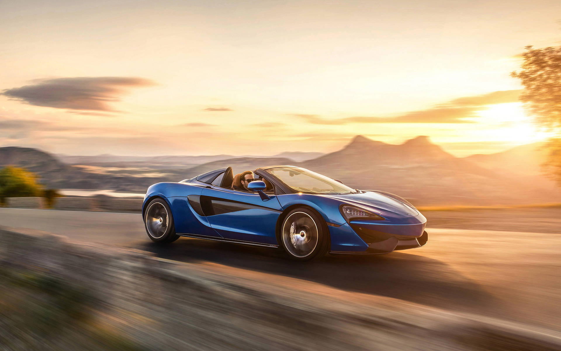 Blue Mclaren Spyder Travelling Background