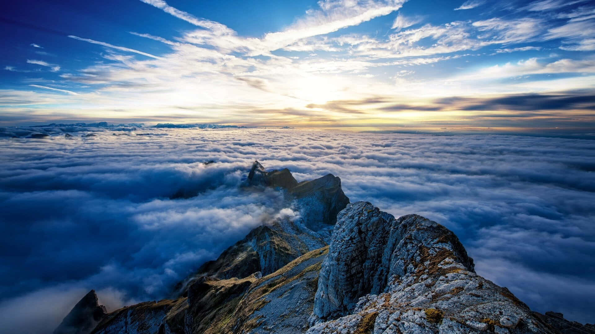 Blue Mountain Above The Clouds Background