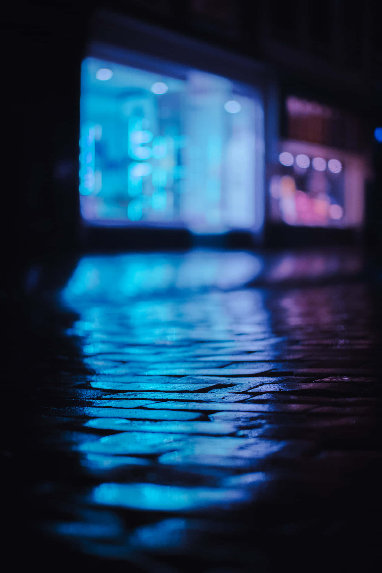 Blue Neon Glow Cobblestone Street Background