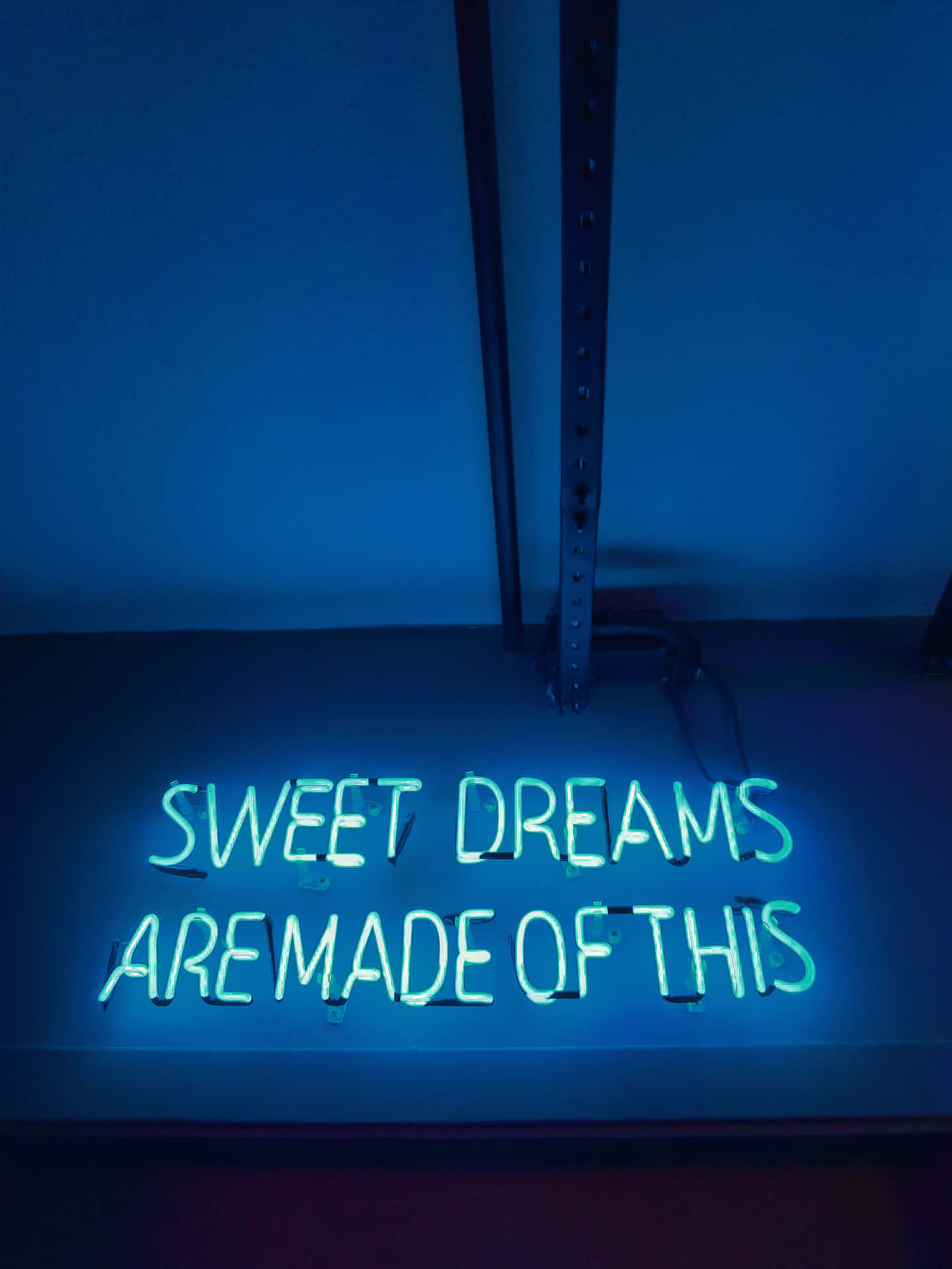 Blue Neon Lights Create A Glowing Illumination Background