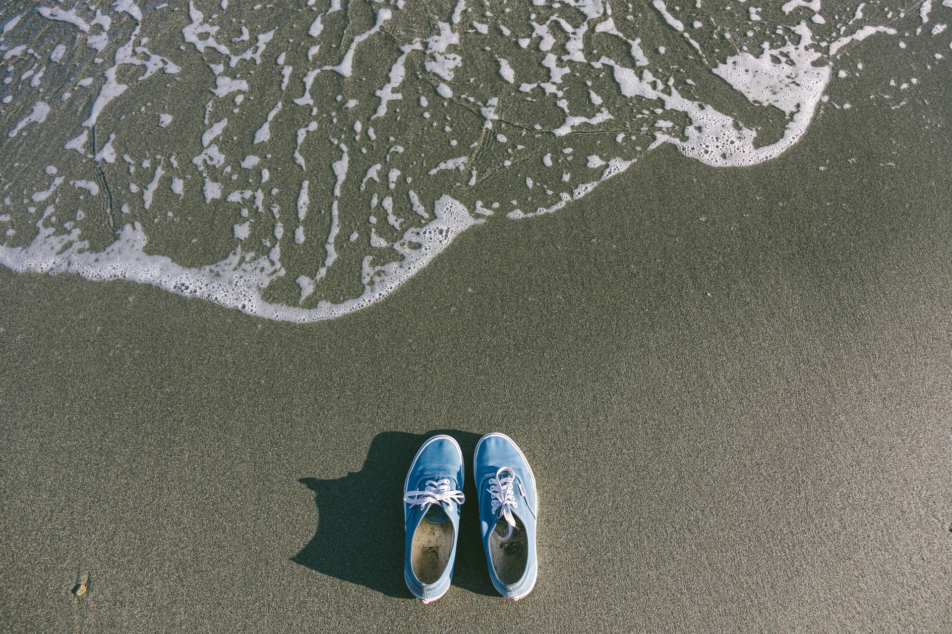 Blue Shoes By The Beach Background