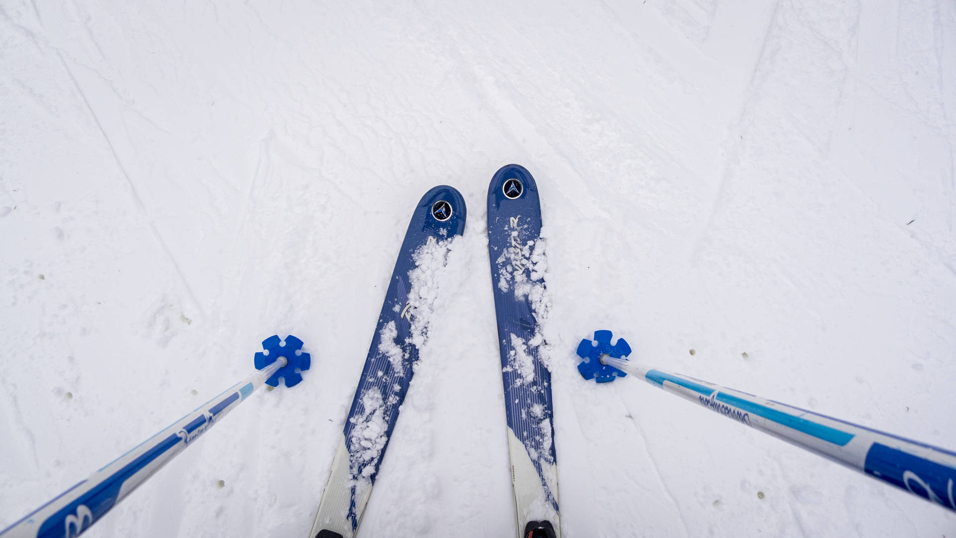 Blue Skiing Board And Poles Background