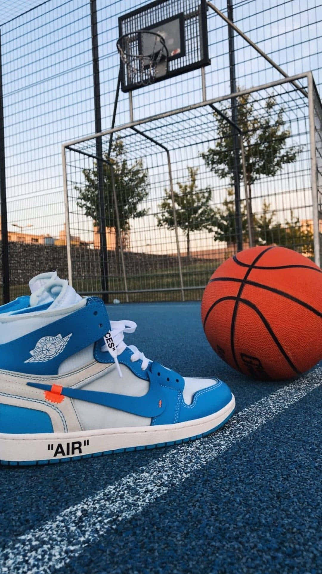 Blue Sneakers Basketball Court Evening Background
